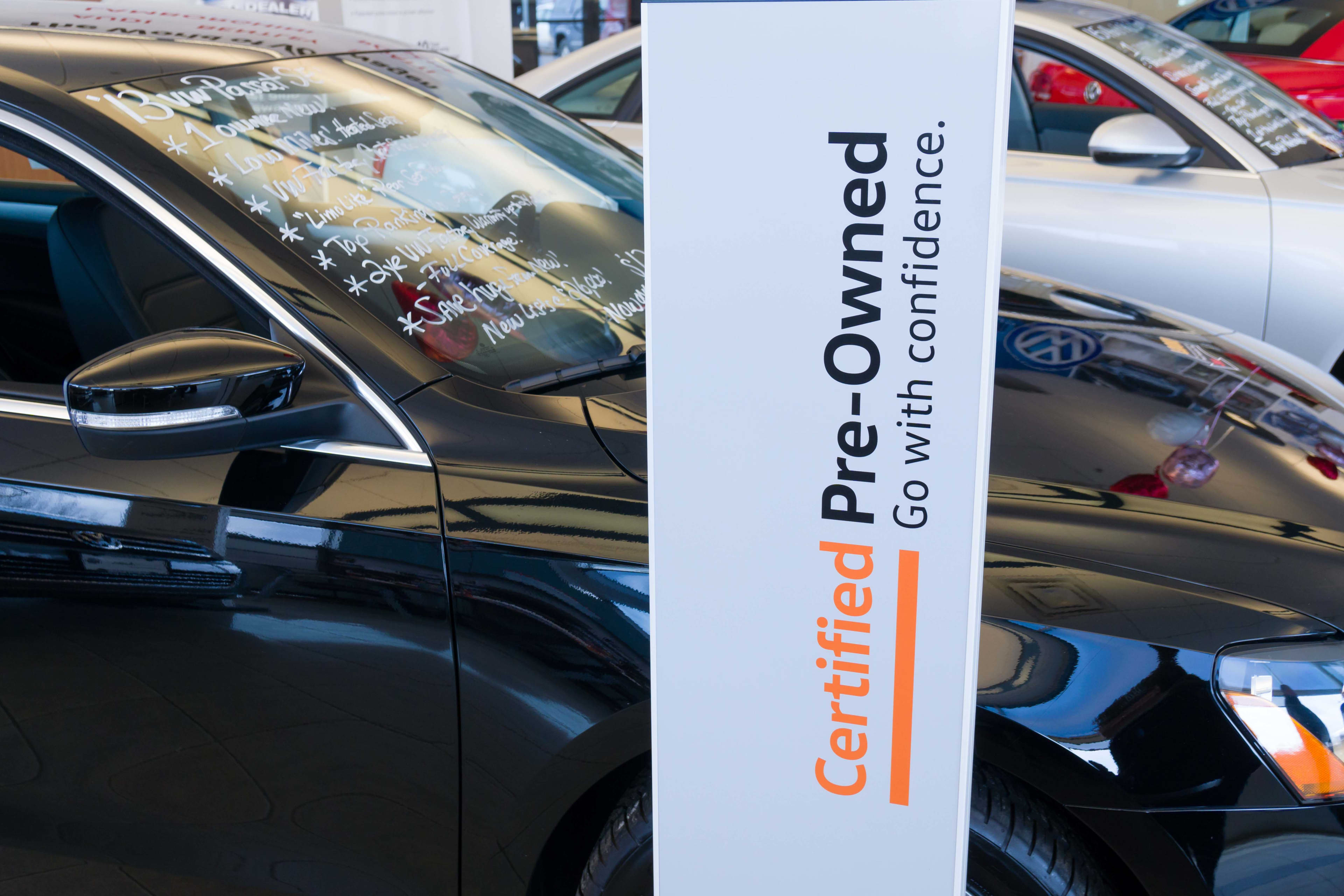 Certified pre-owned car signage at a car dealership
