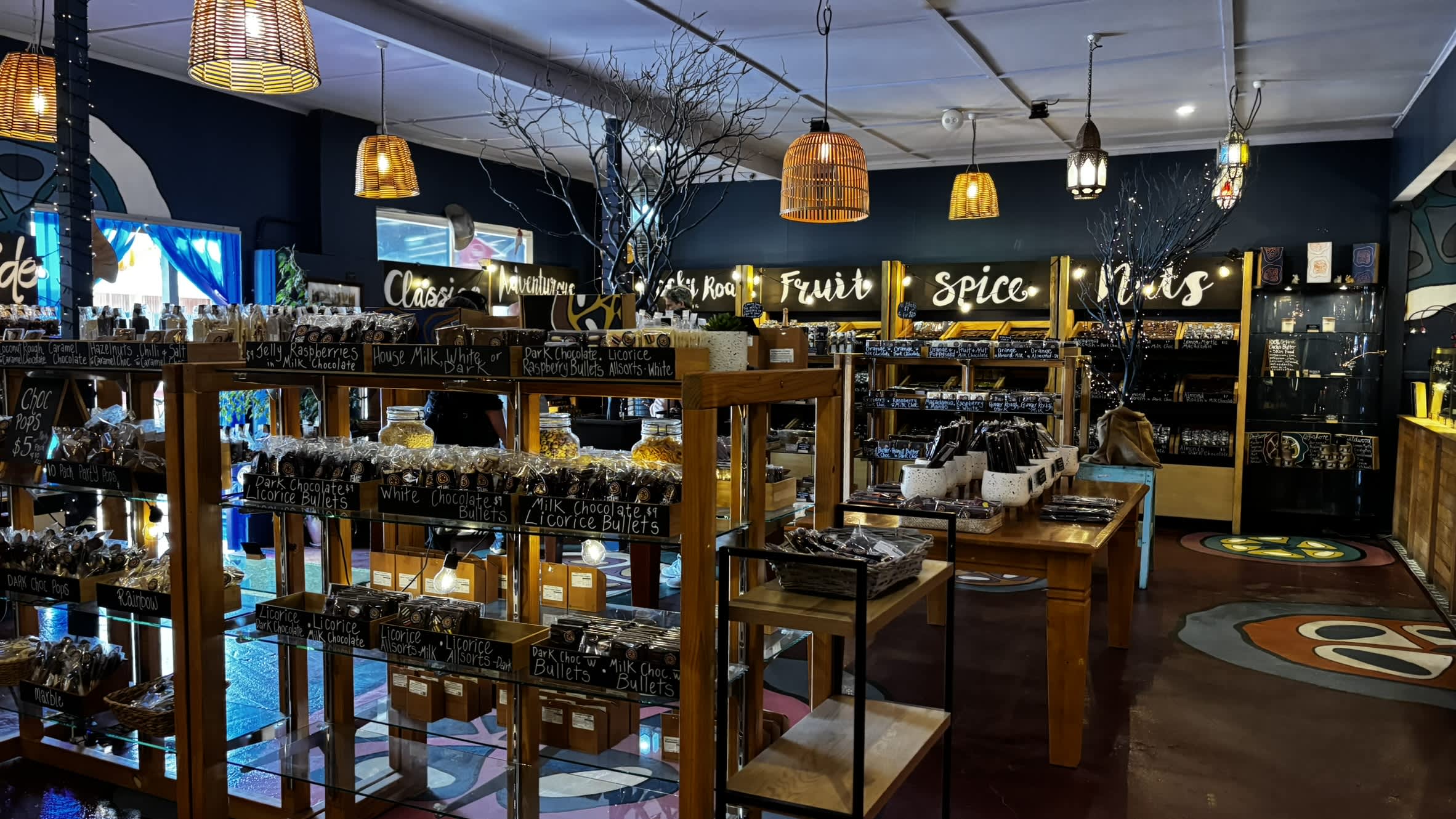 Racks of produce inside Temper Temper chocolate