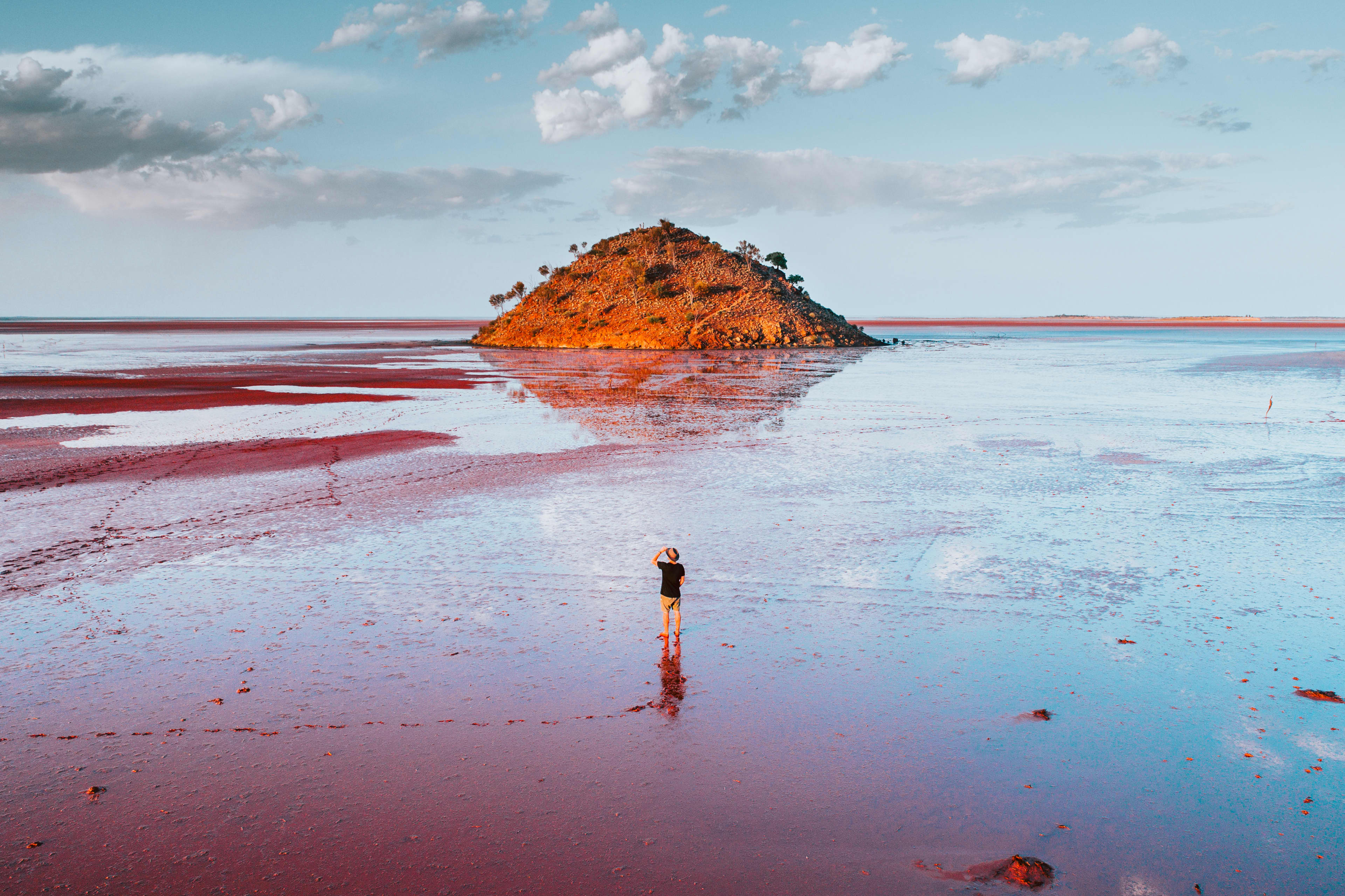 A person standing on flooded ground at Lake Ballard