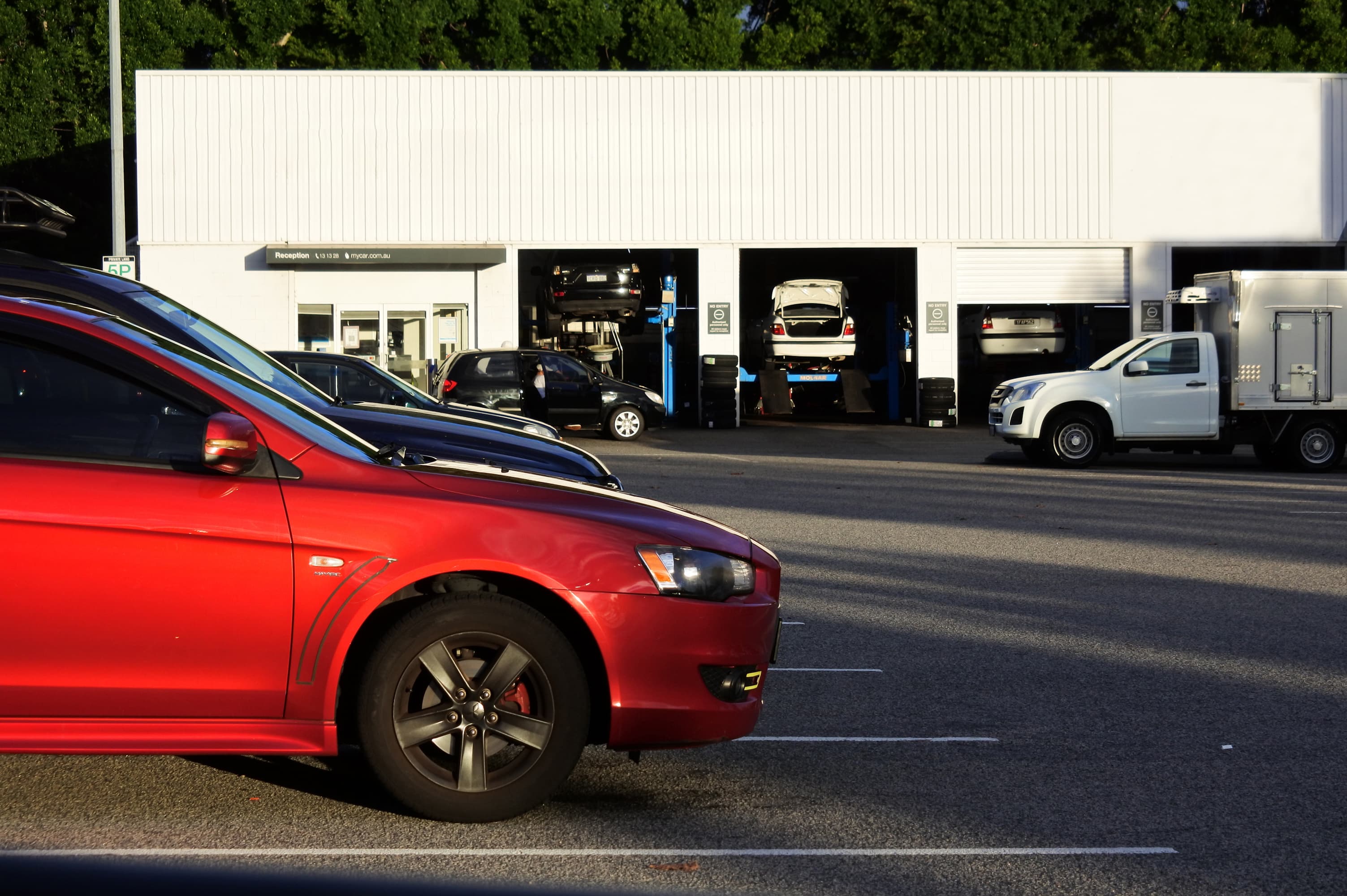 The front of a car servicing centre on a busy road