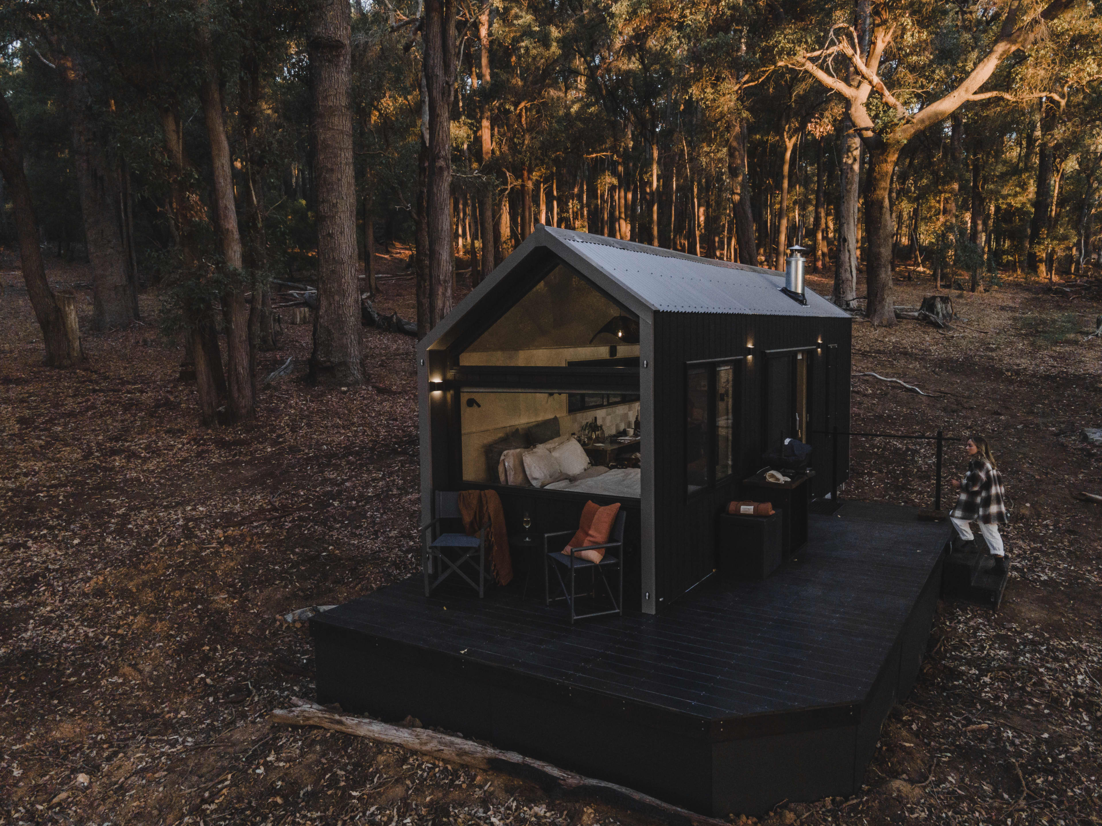 A cabin shown in a forest in Ferguson Valley
