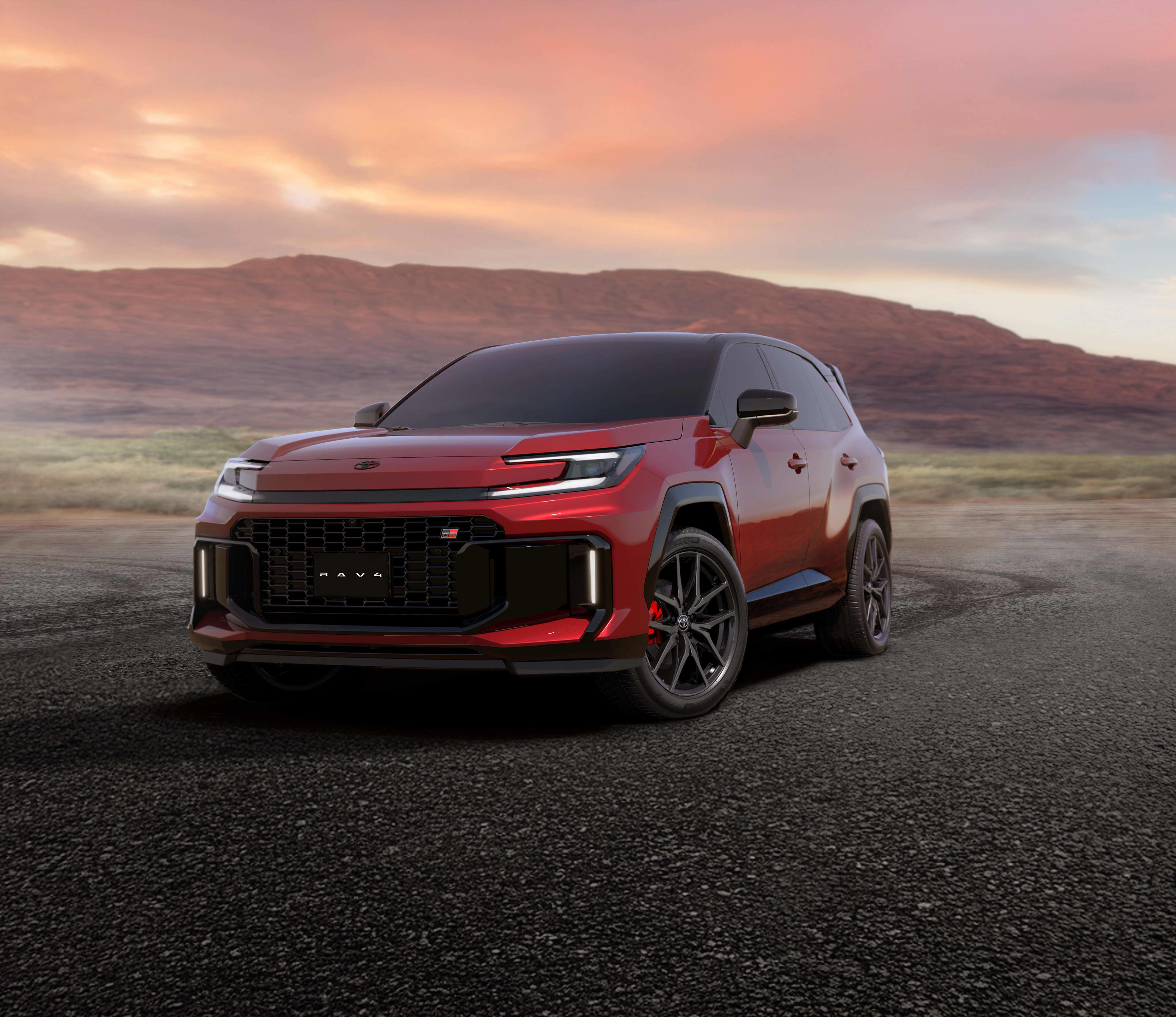A red Toyota RAV4 PHEV in desolate landscape