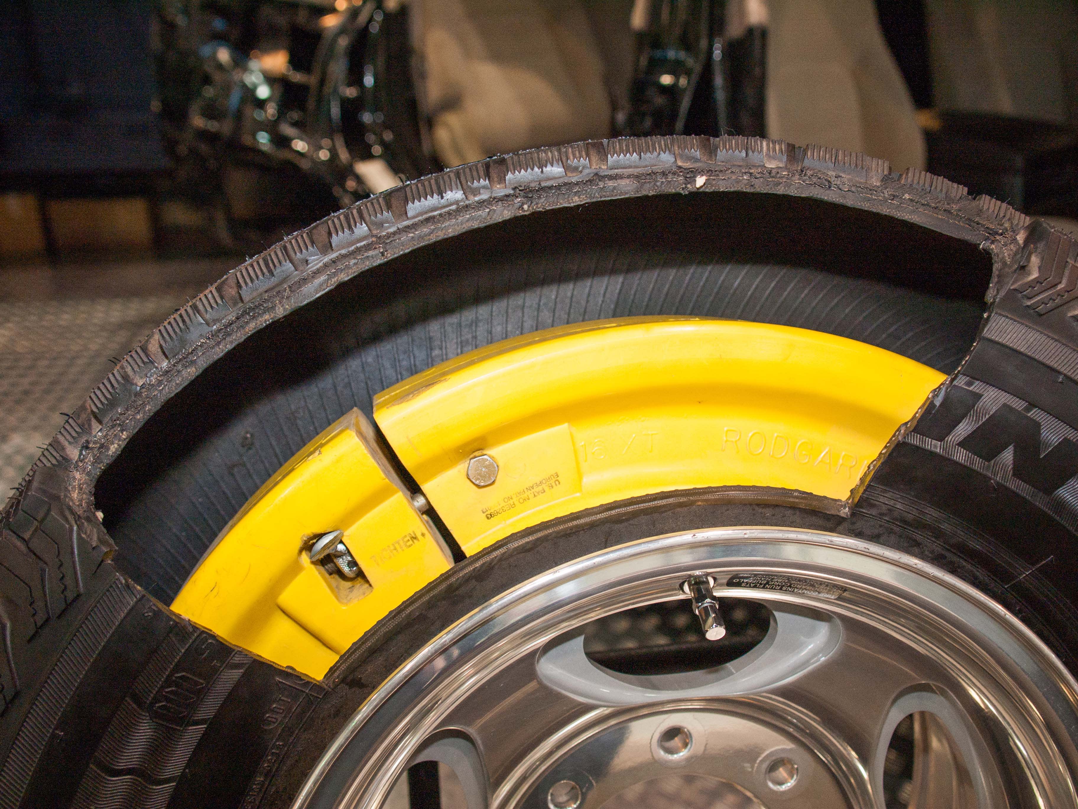 A cut away section of a run flat tyre