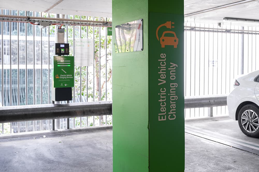 A public EV charging station in a multistorey carpark