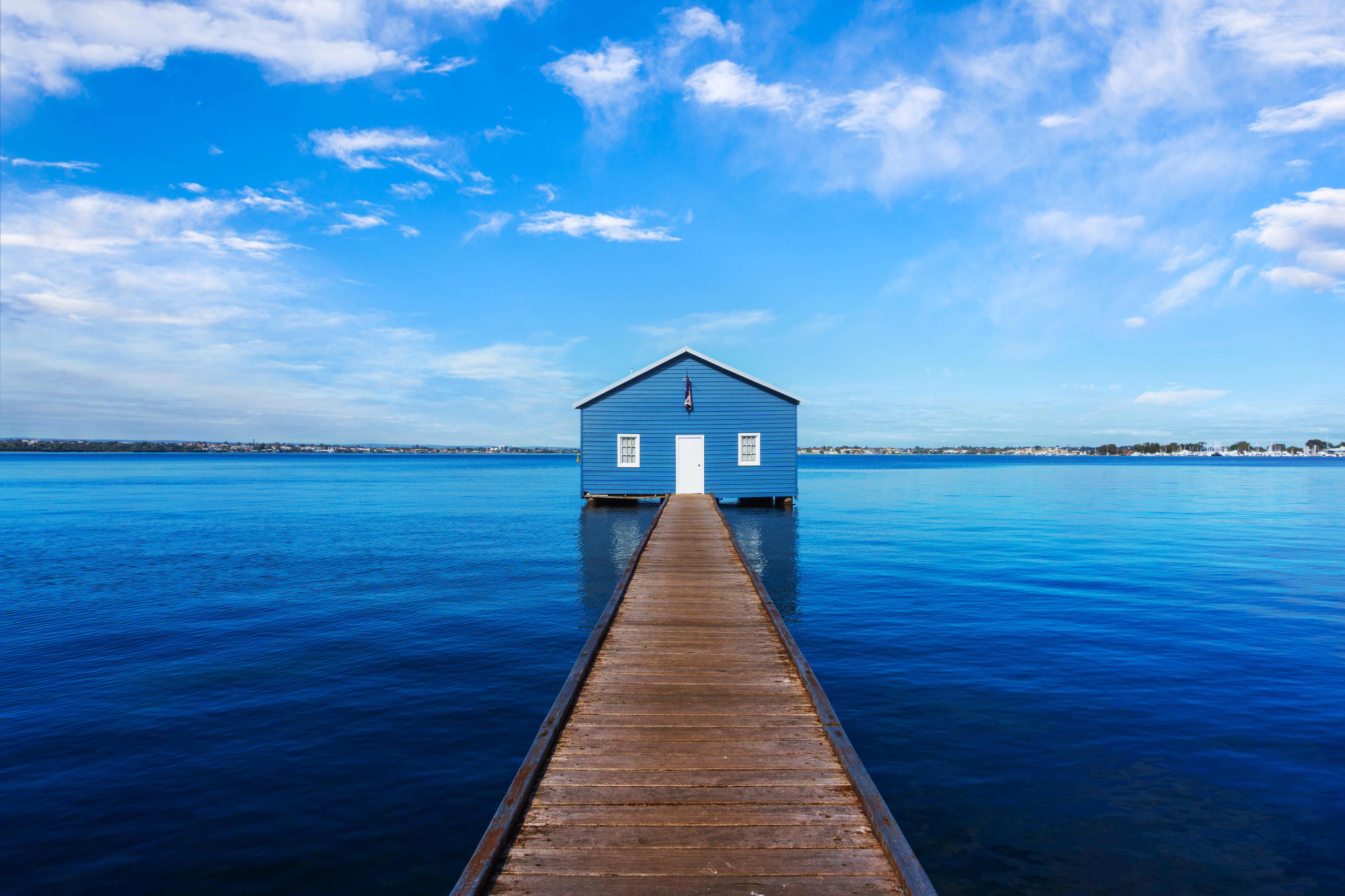 The blue boatshed over the Swan  River in Crawley, Perth