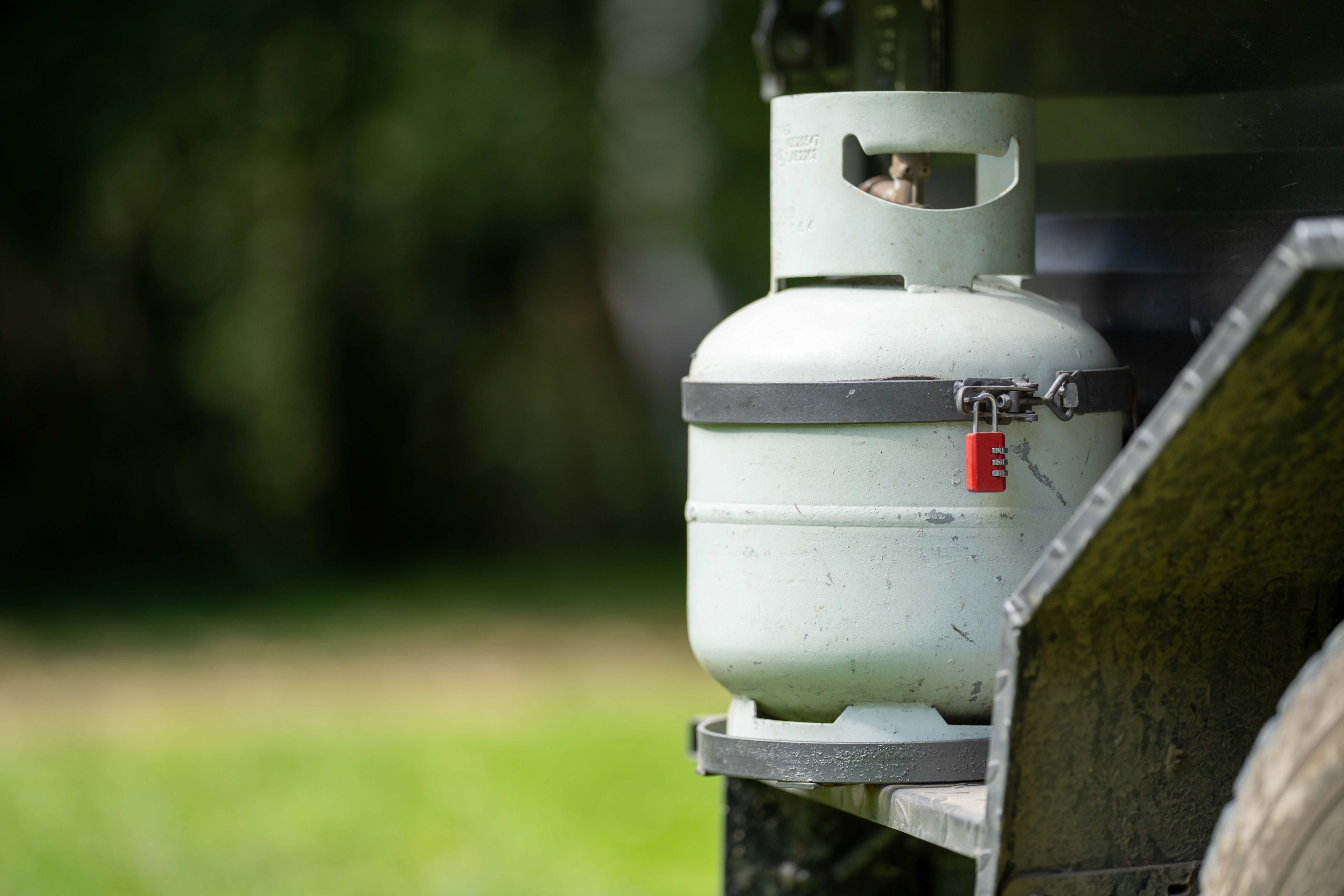 A gas bottle on the back of a caravan