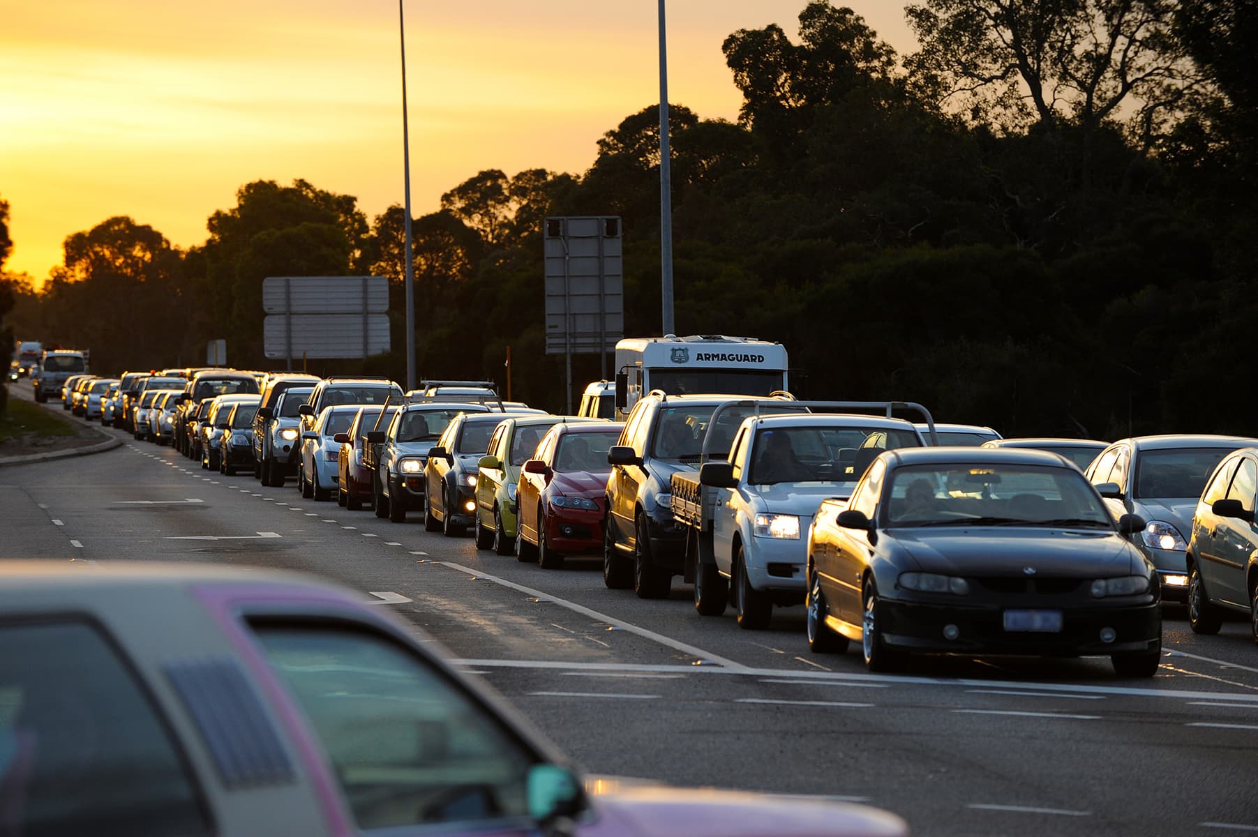 Peak hour traffic on a Perth highway in the early evening