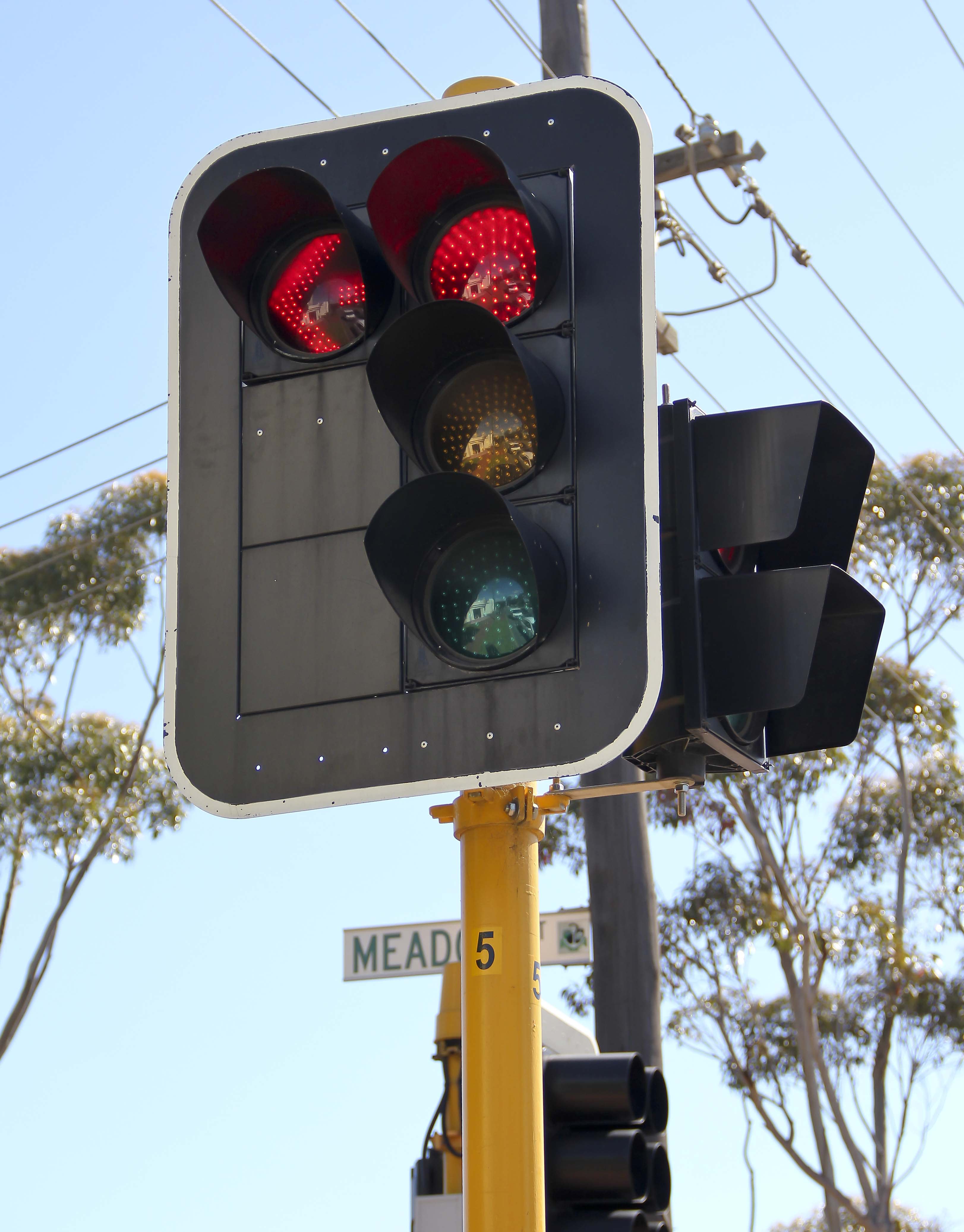 A close-up of a traffic light