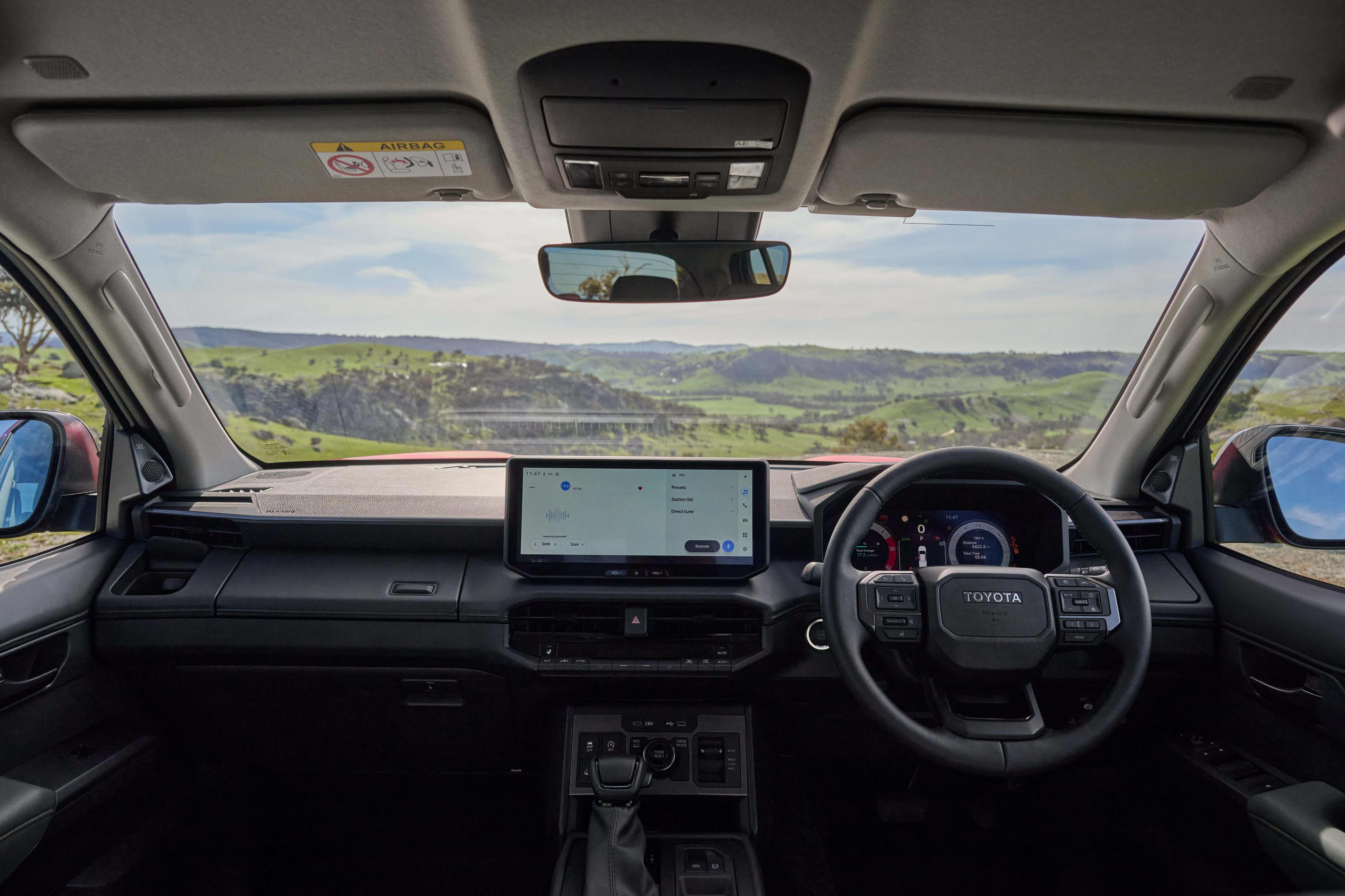 The interior of a Toyota HiLux showing the dashboard