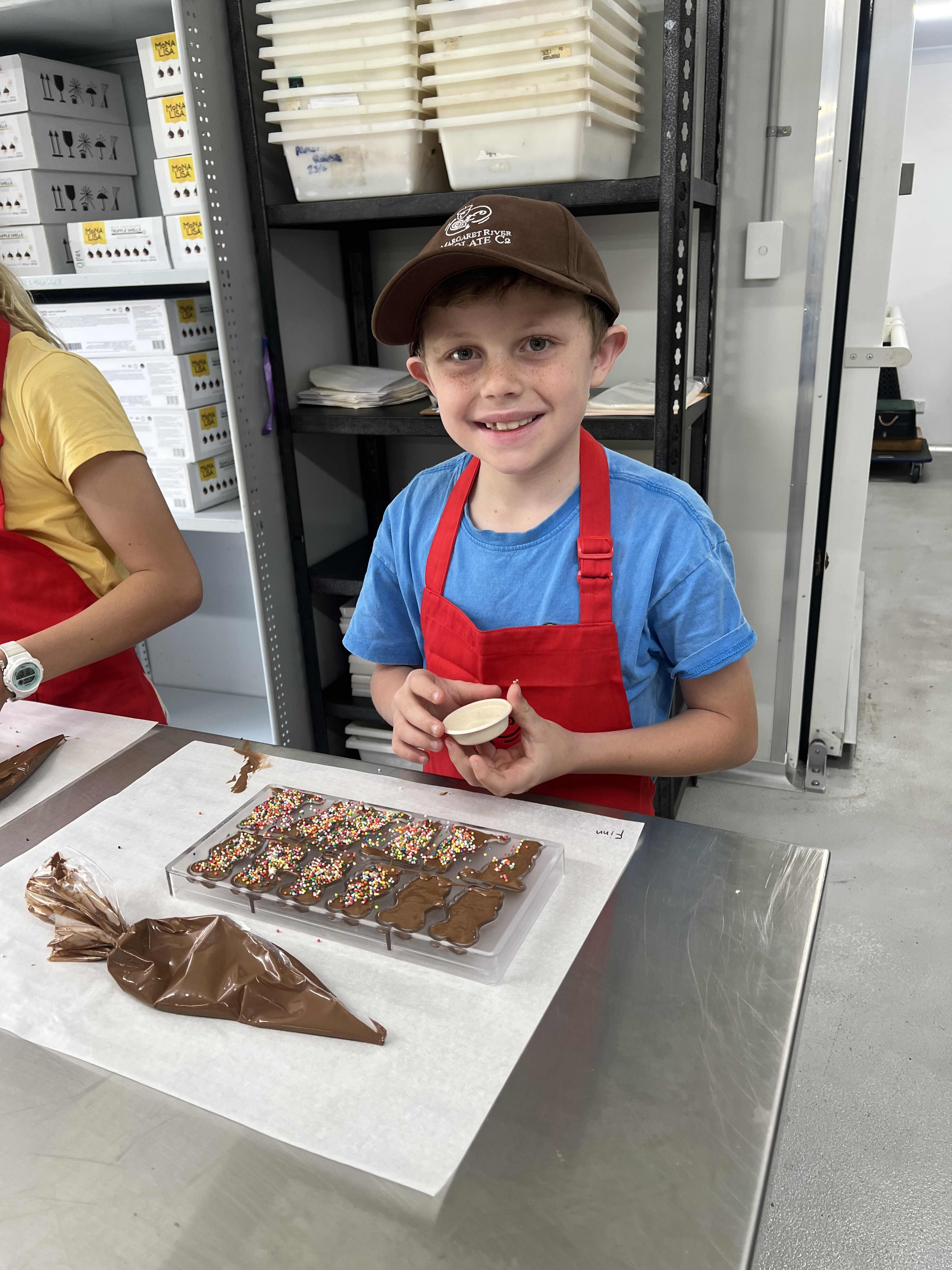 Young boy making chocolate