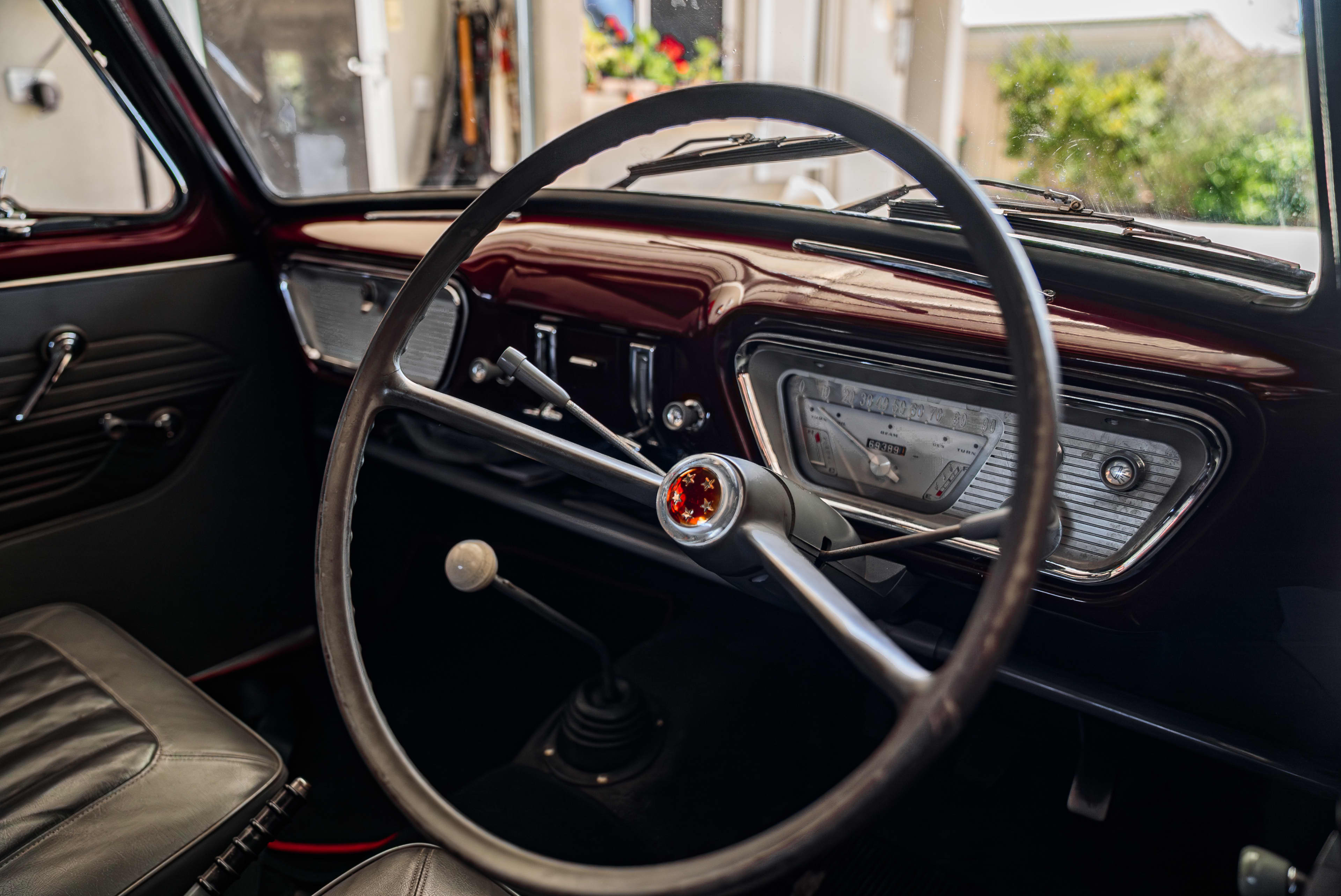Interior of 1963 Ford Anglia showing dash and steering wheel