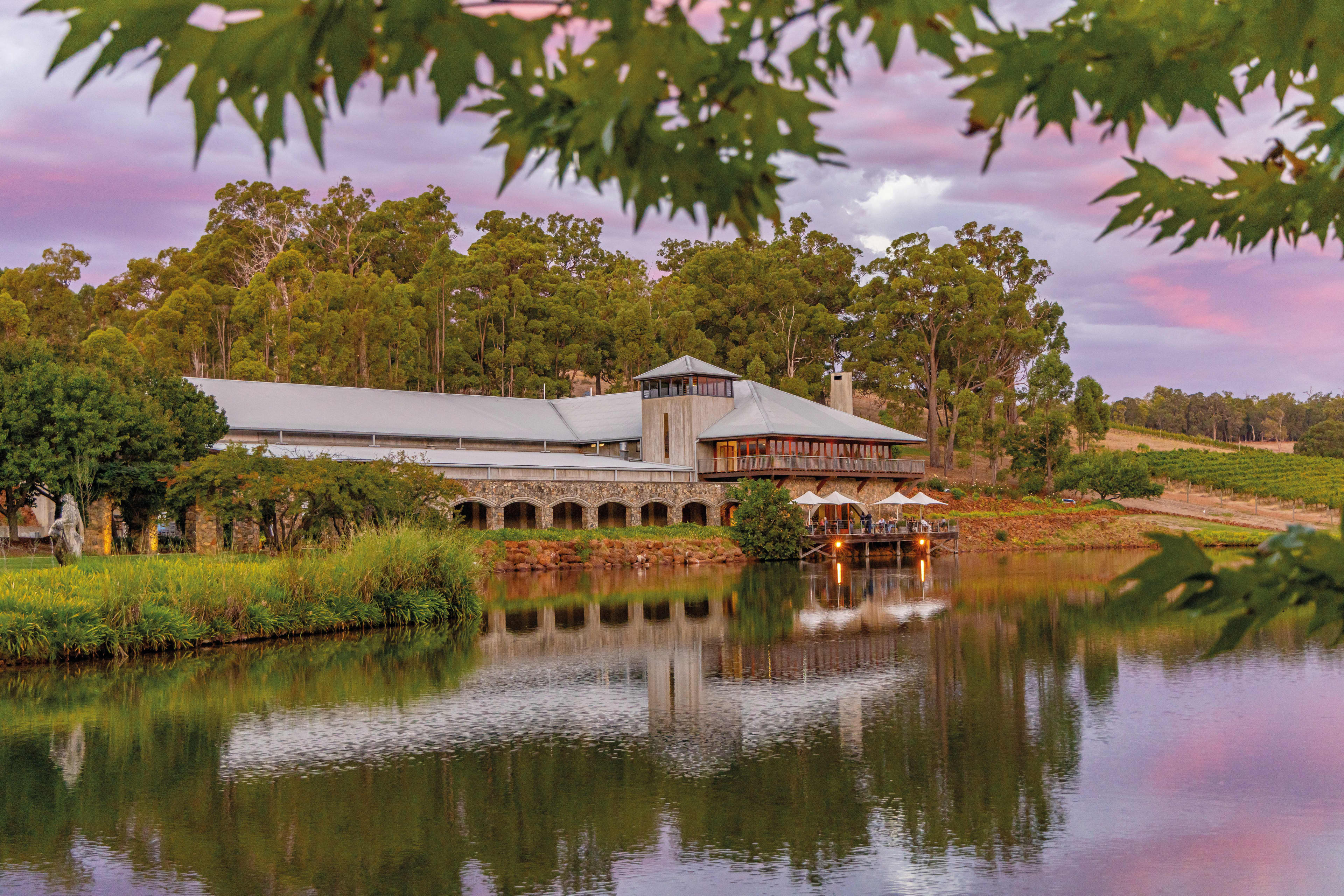 View of Millbrook Winery across water at sunset