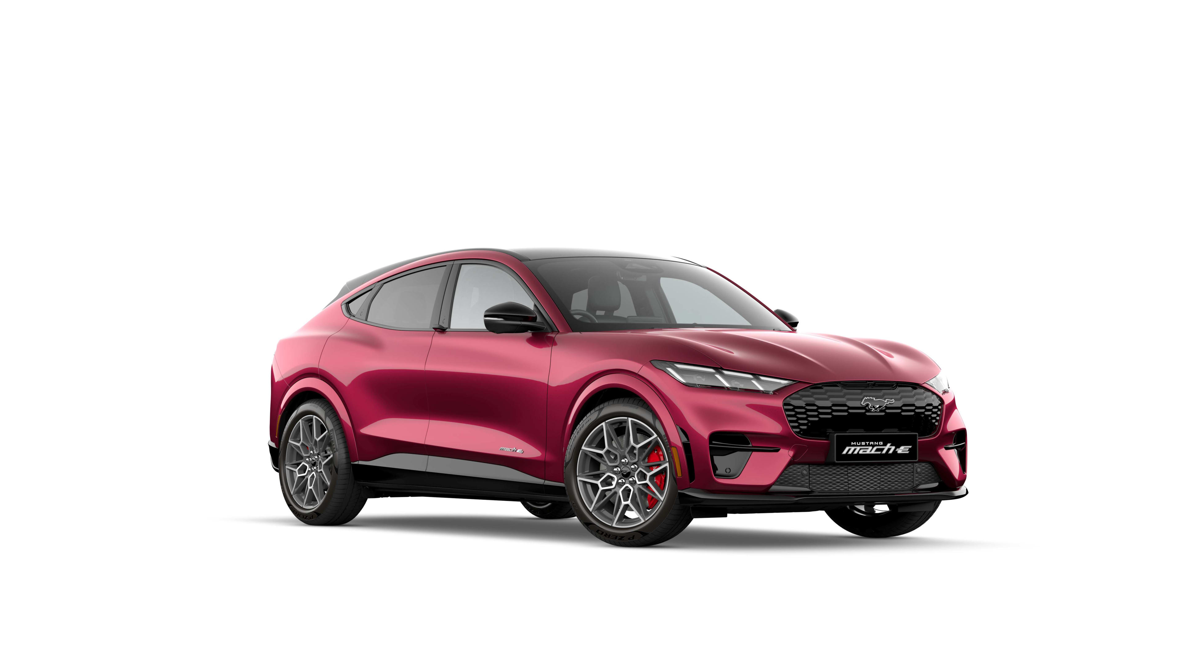 A red Mustang Mach-E in a studio setting