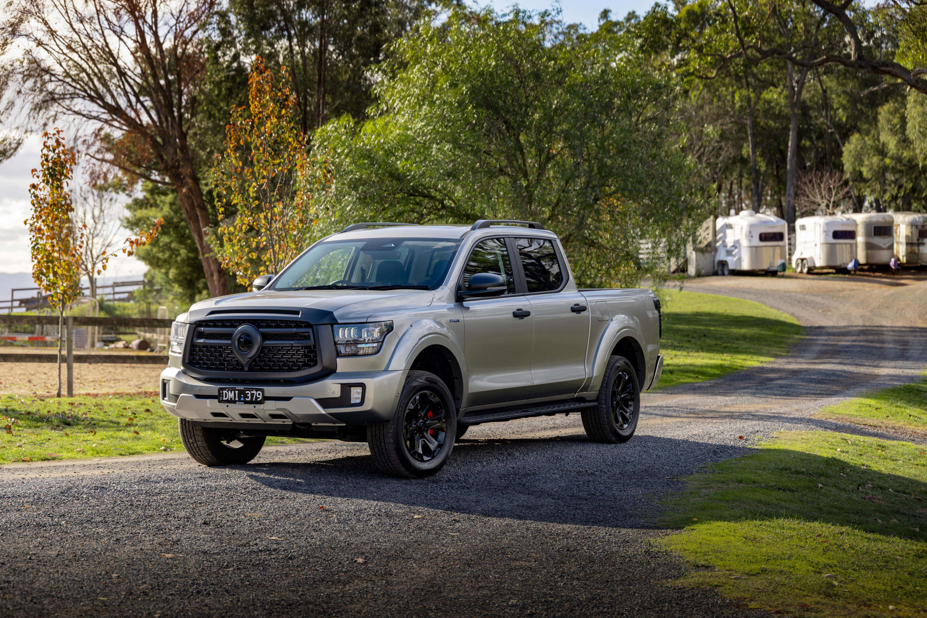 A grey GWM Cannon Alpha Ultra PHEV on a country road