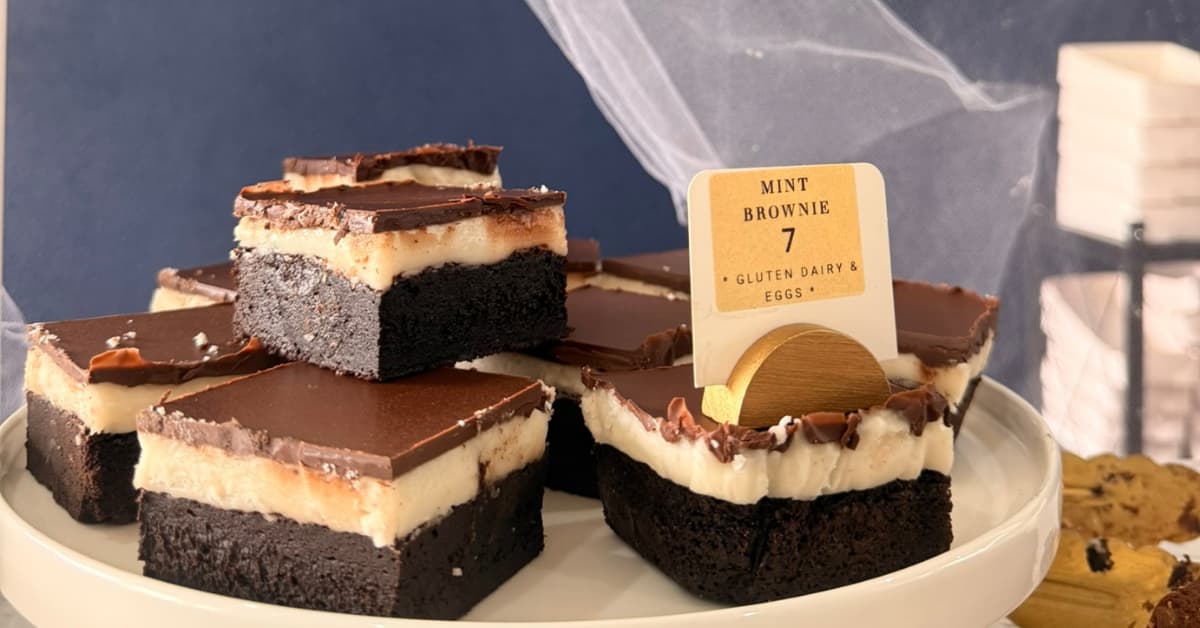 Stack of mint brownies inside cafe cabinet