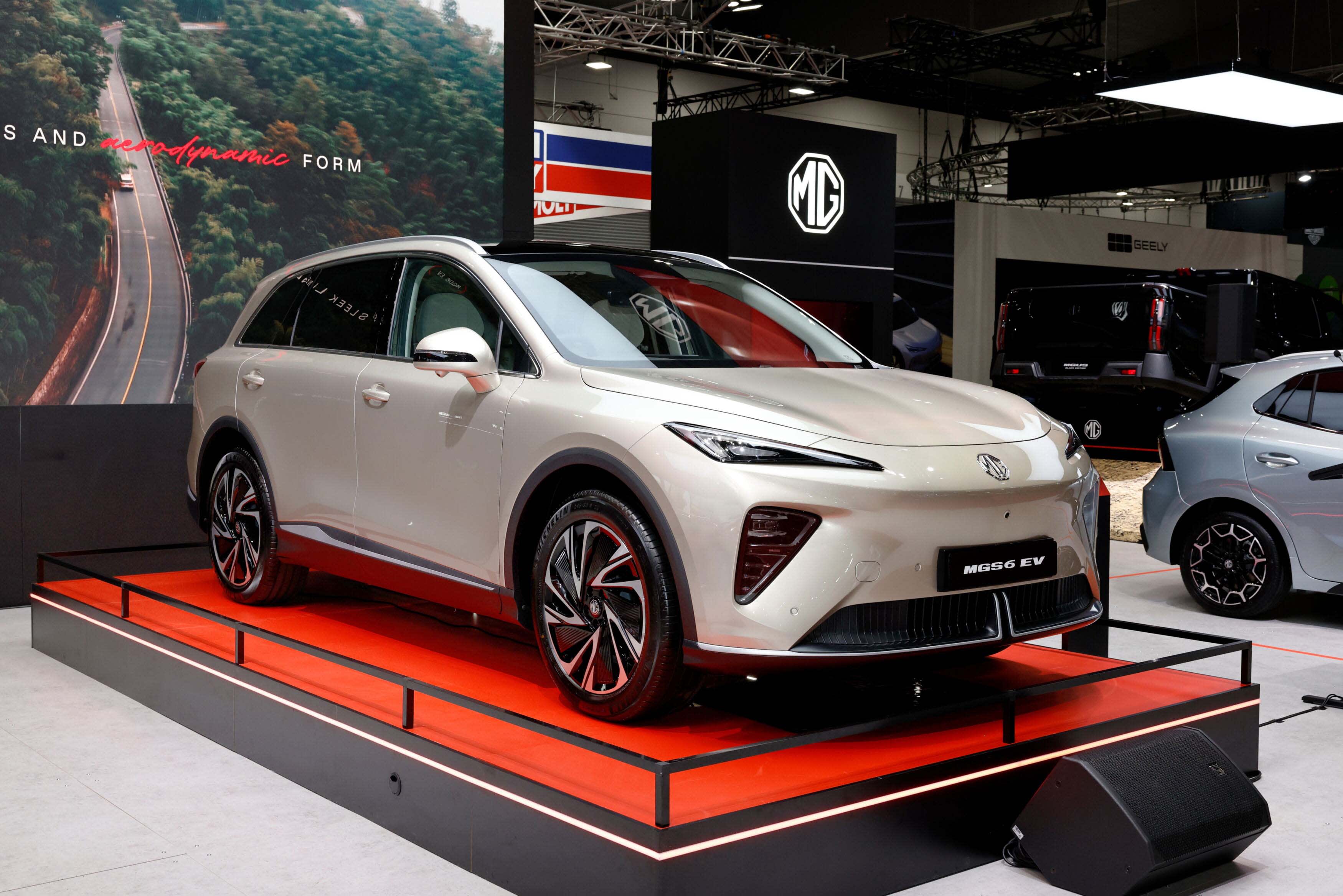 A white MG S6 on a car show display stand