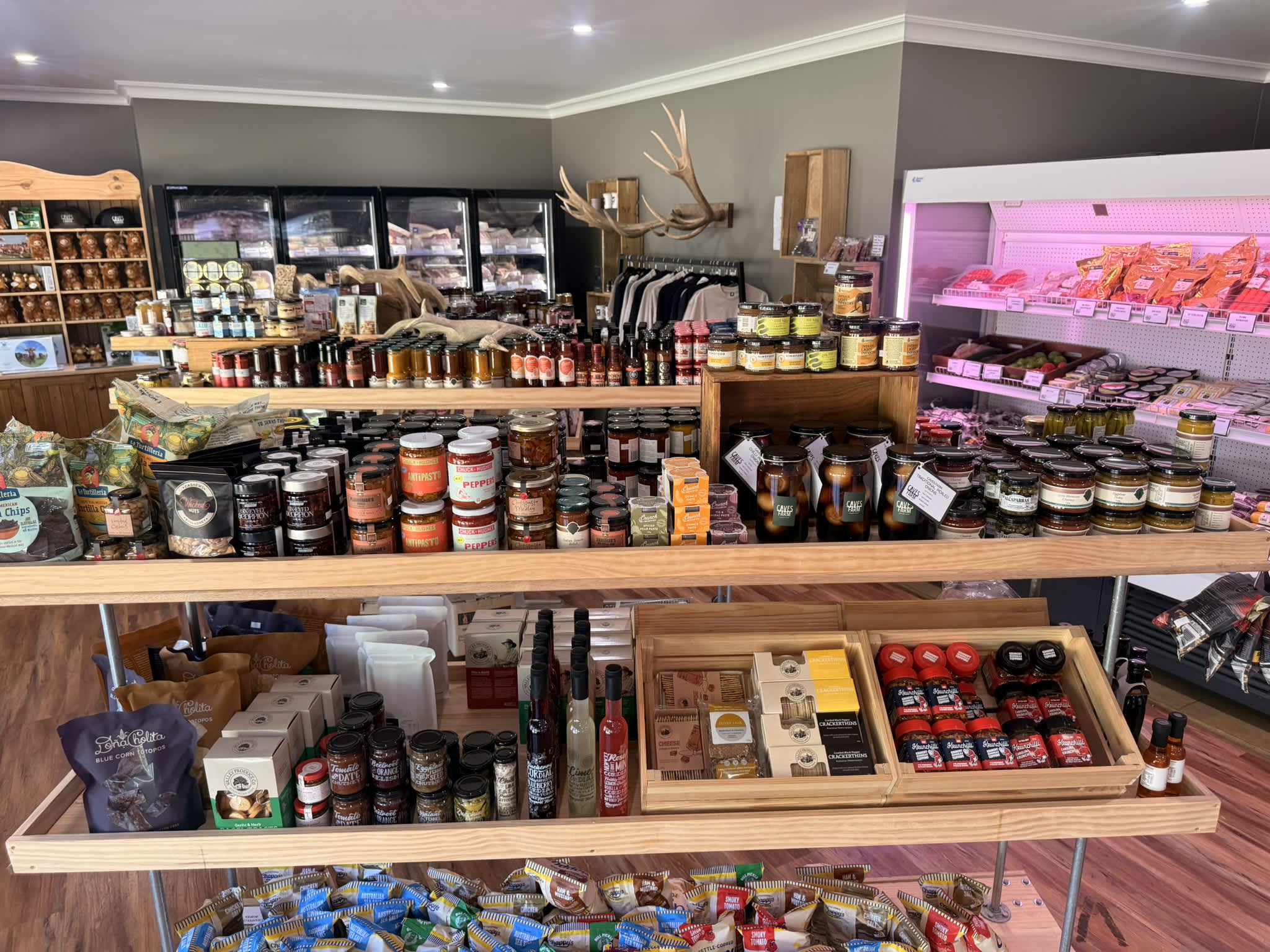 Farm shop filled with pantry items like sauces and jams and condiments