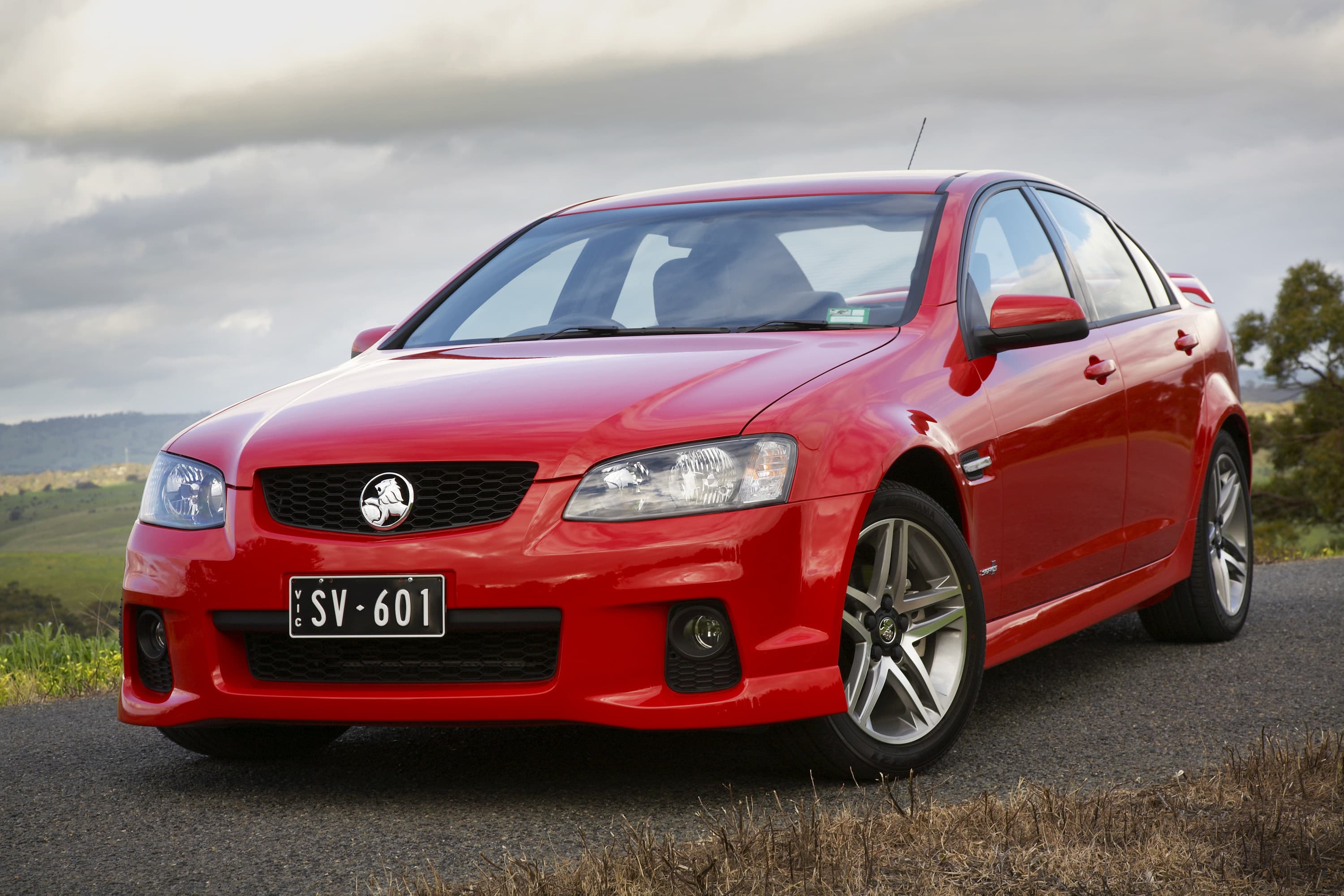 A red Holden Commodore from 2011