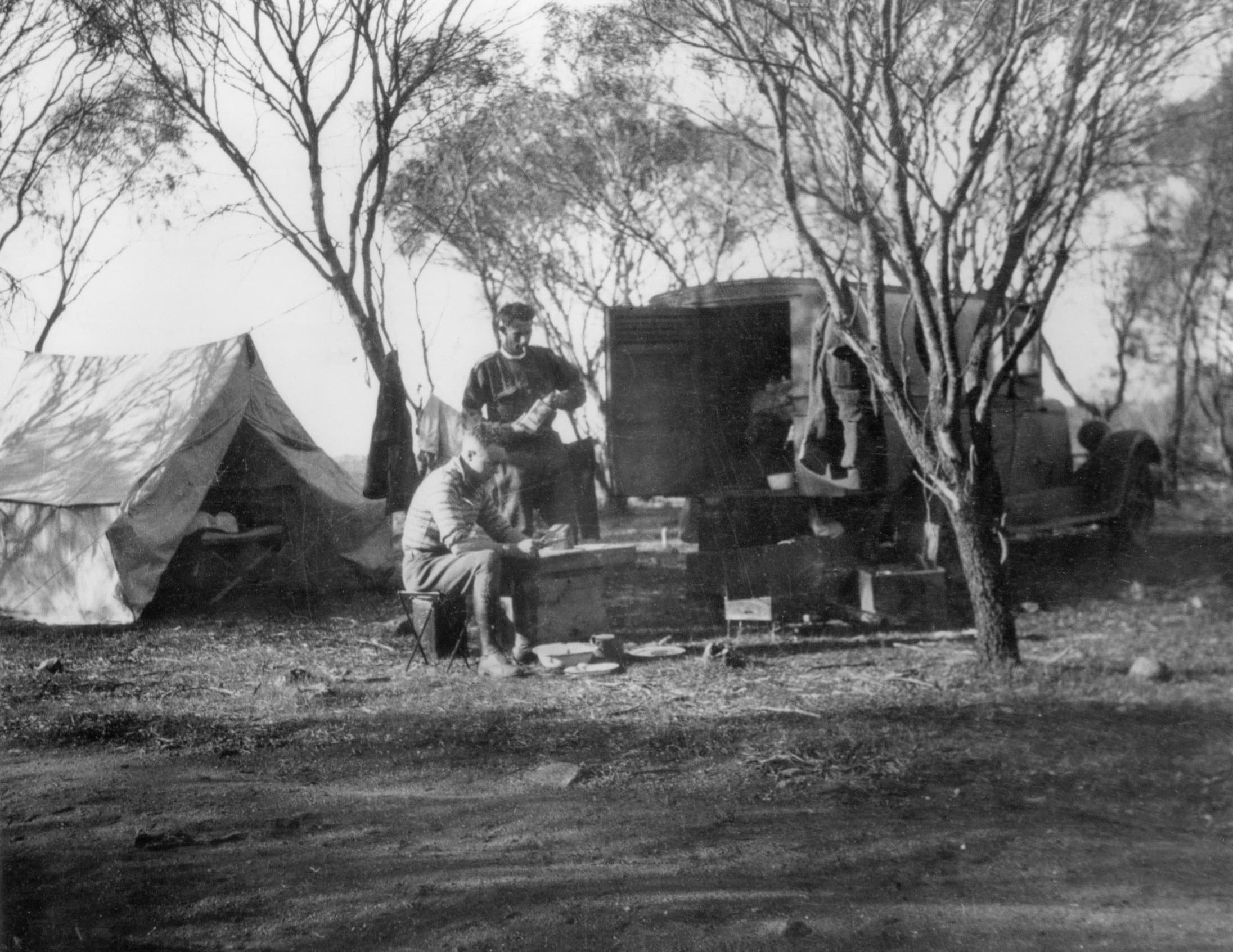 Two RAC Patrols camping in the bush in the early years of roadside assistance.