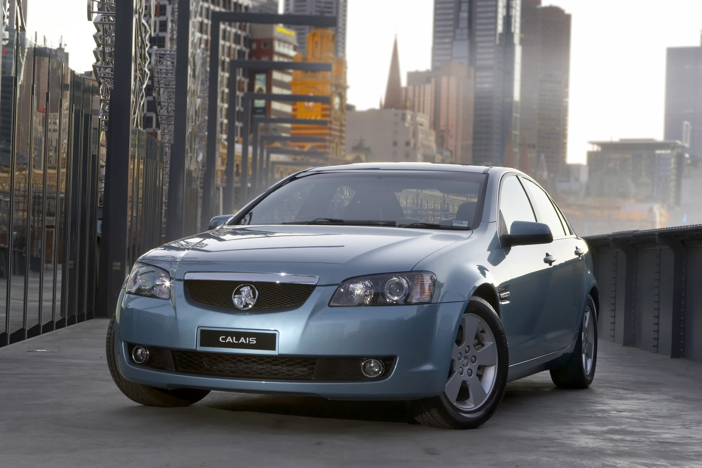 A grey 2006 Holden VE Calais on a city street