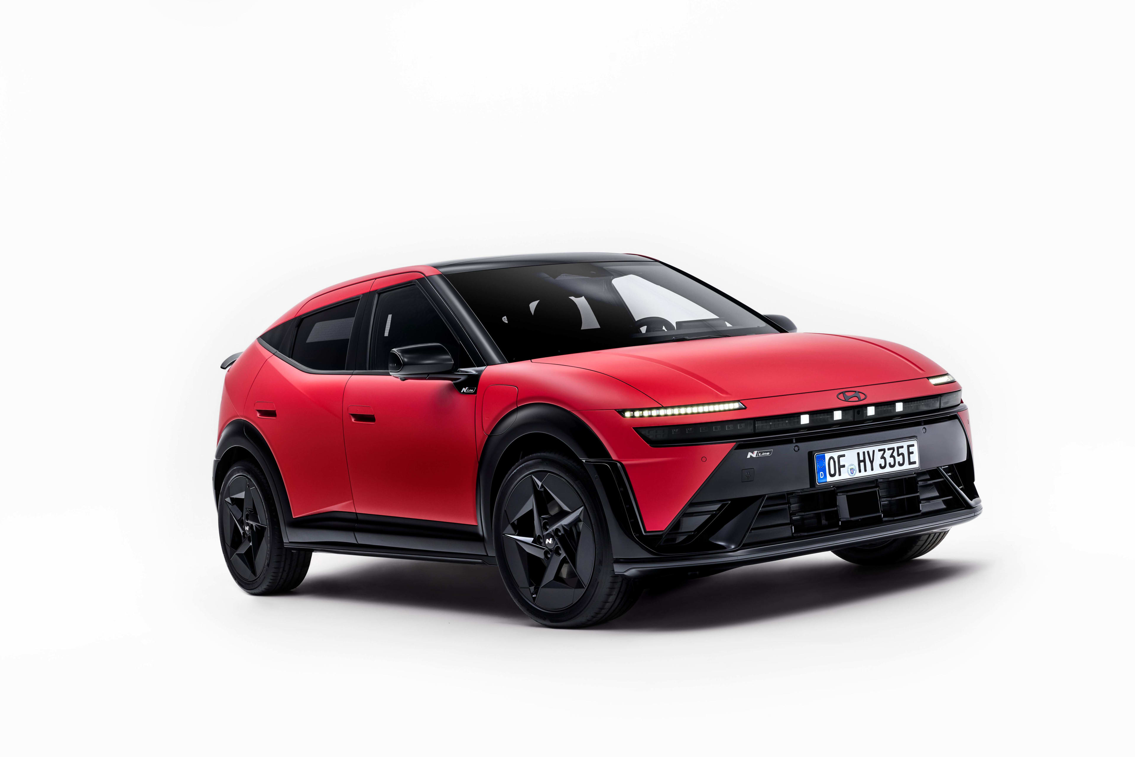 A red Beijing Hyundai ioniq in a studio setting