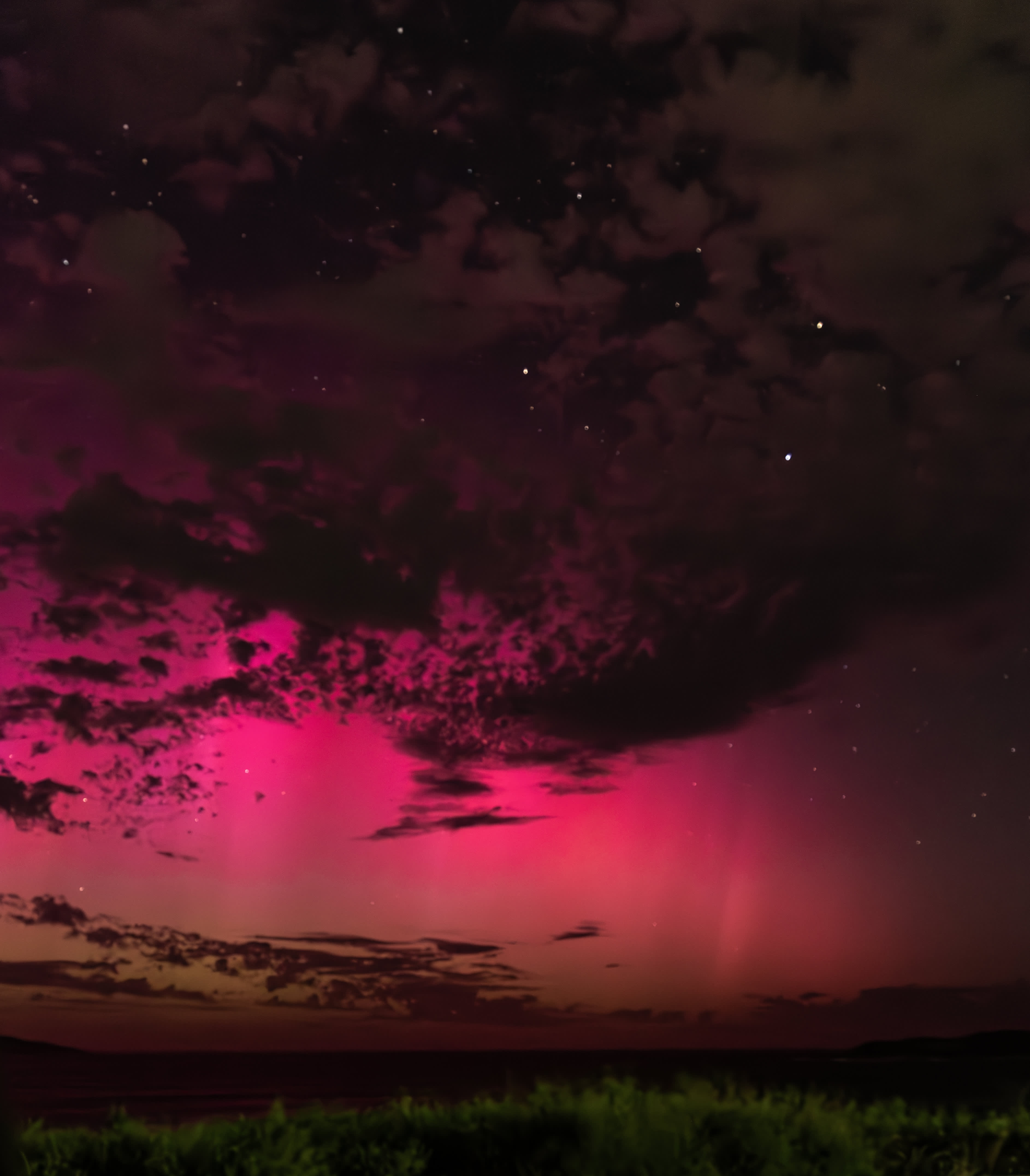 Pink and red glow from Aurora Australis over Esperance