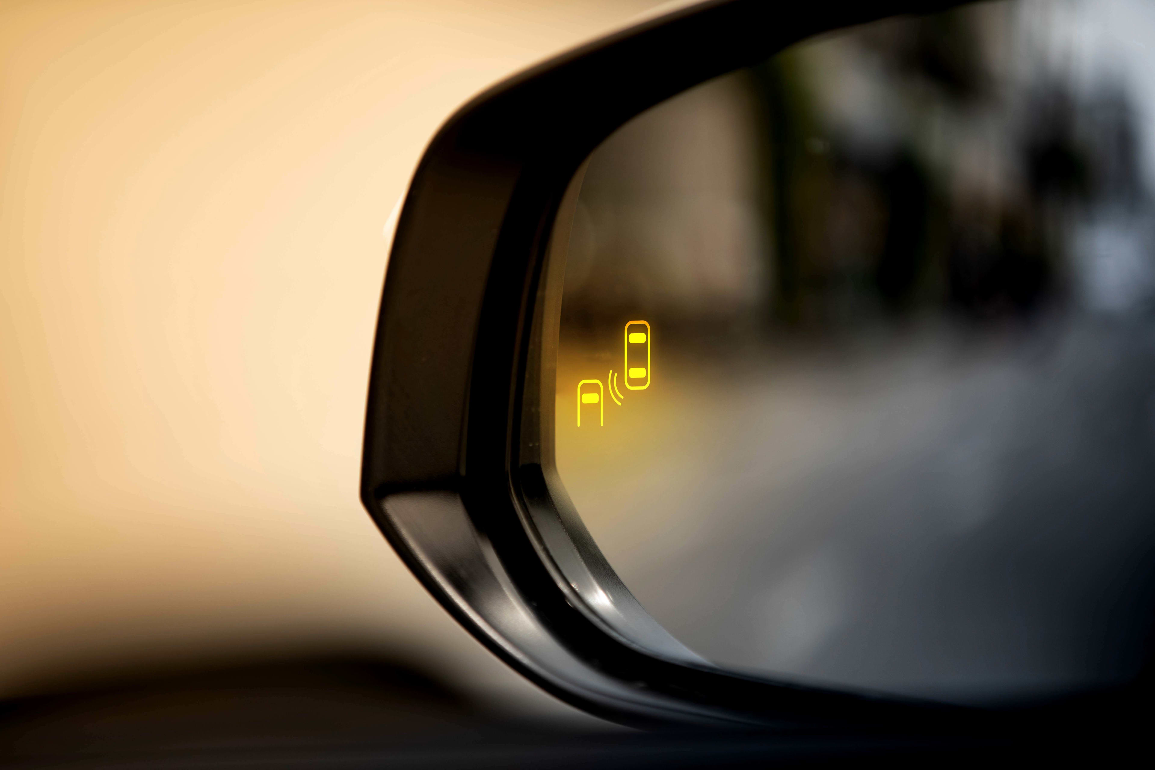 Sensor lights on a car wing mirror