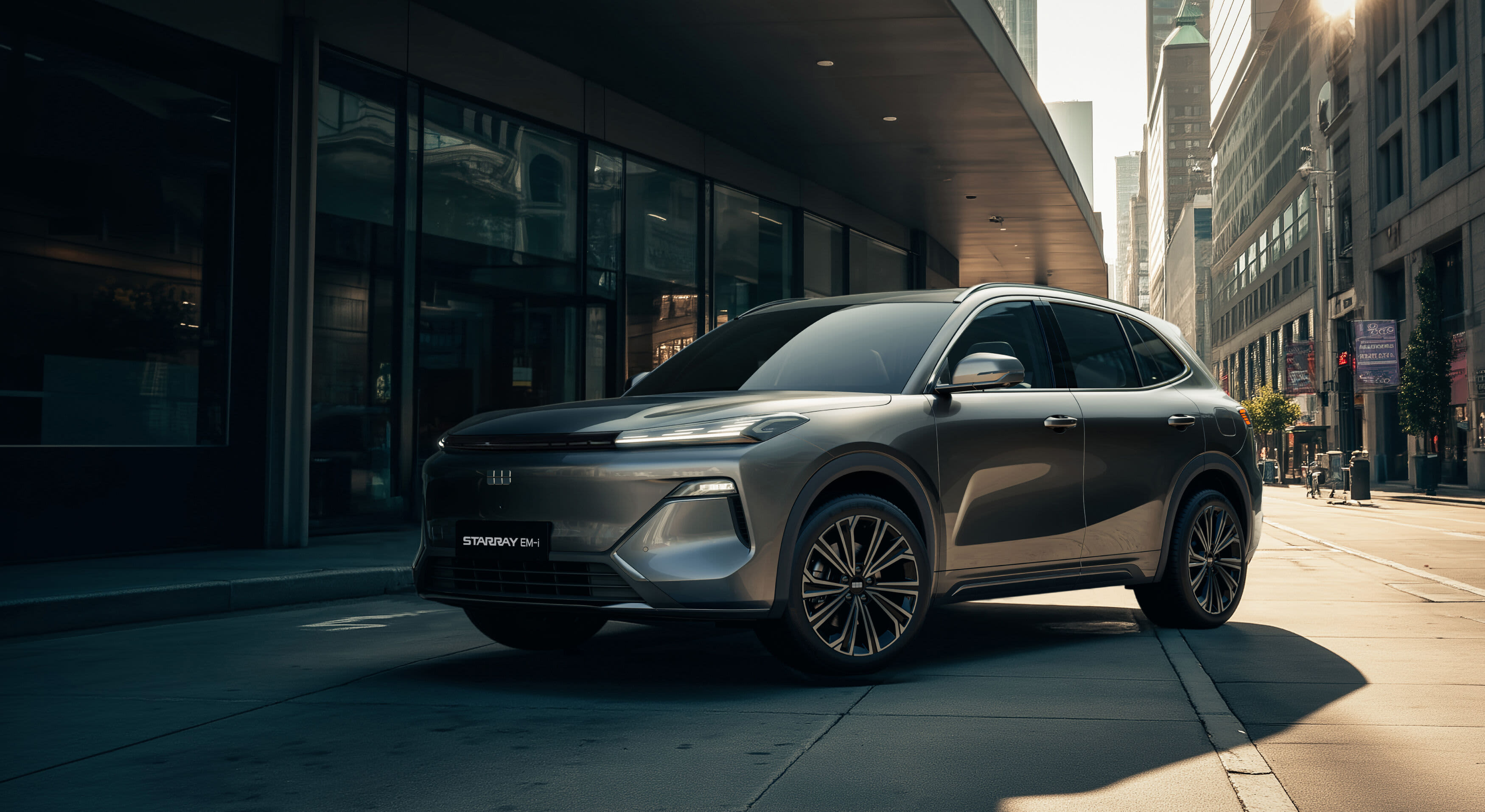 A grey Geely Starray EM-i parked on a city street