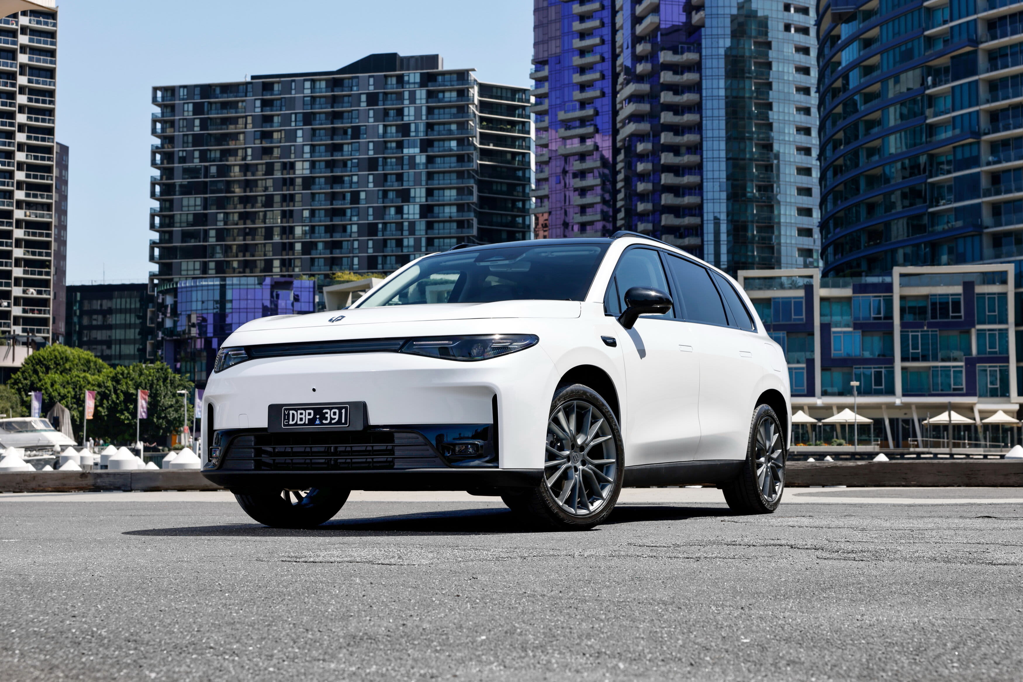 A white Leapmotor C10 parked in a city