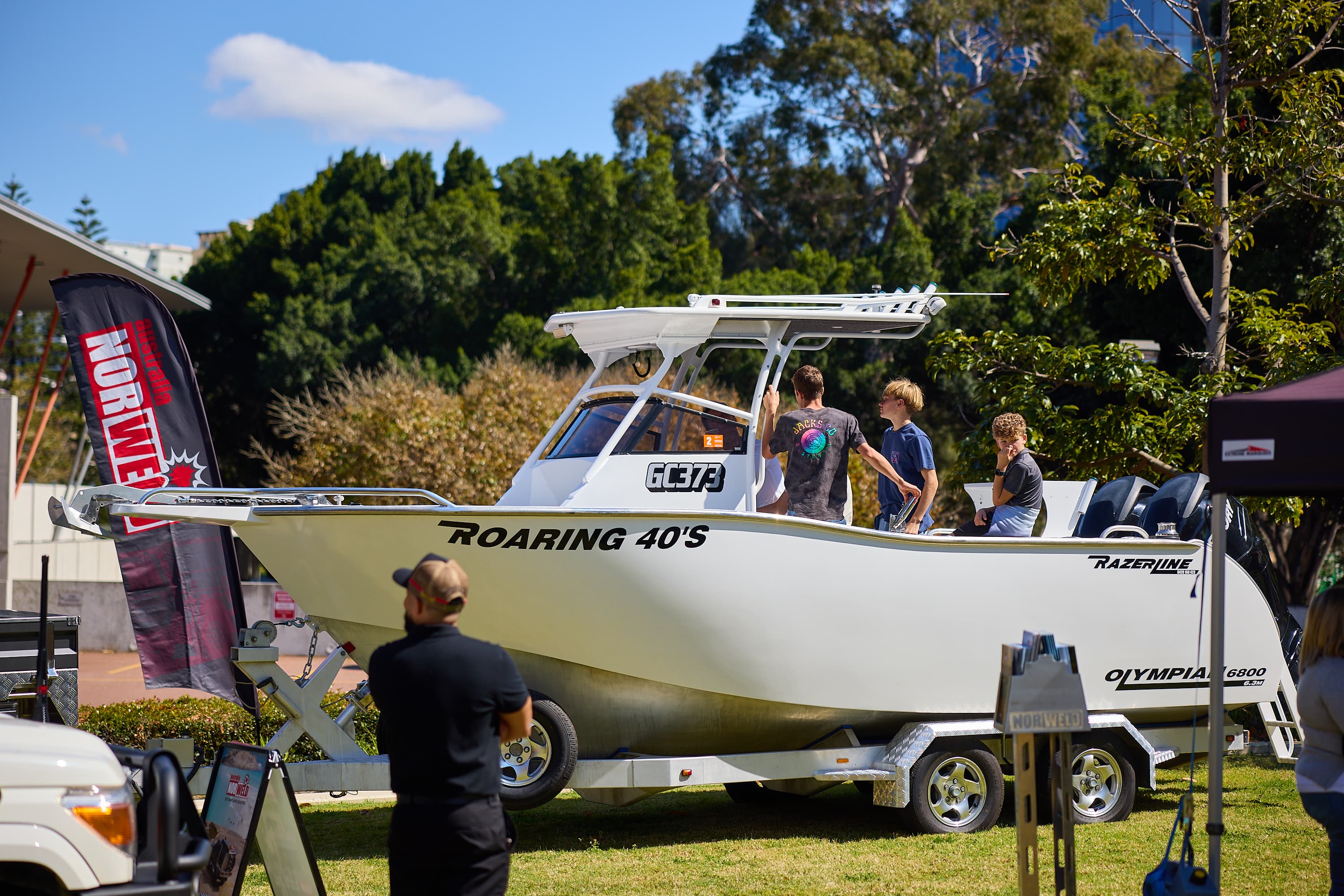 Boat outside at exhibition with people onboard