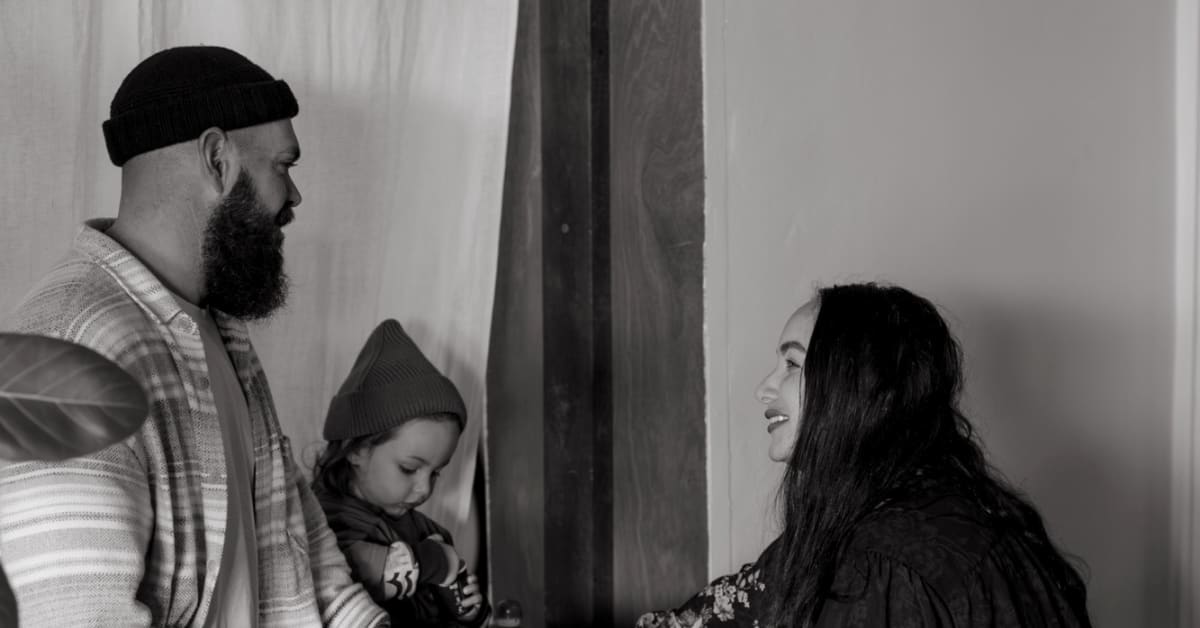 Black and white photo of owners Chey and Malika
