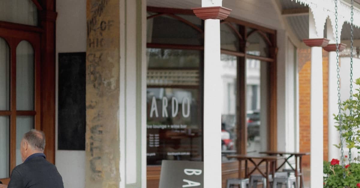 Heritage building of main street with Bardo coffee sign on window