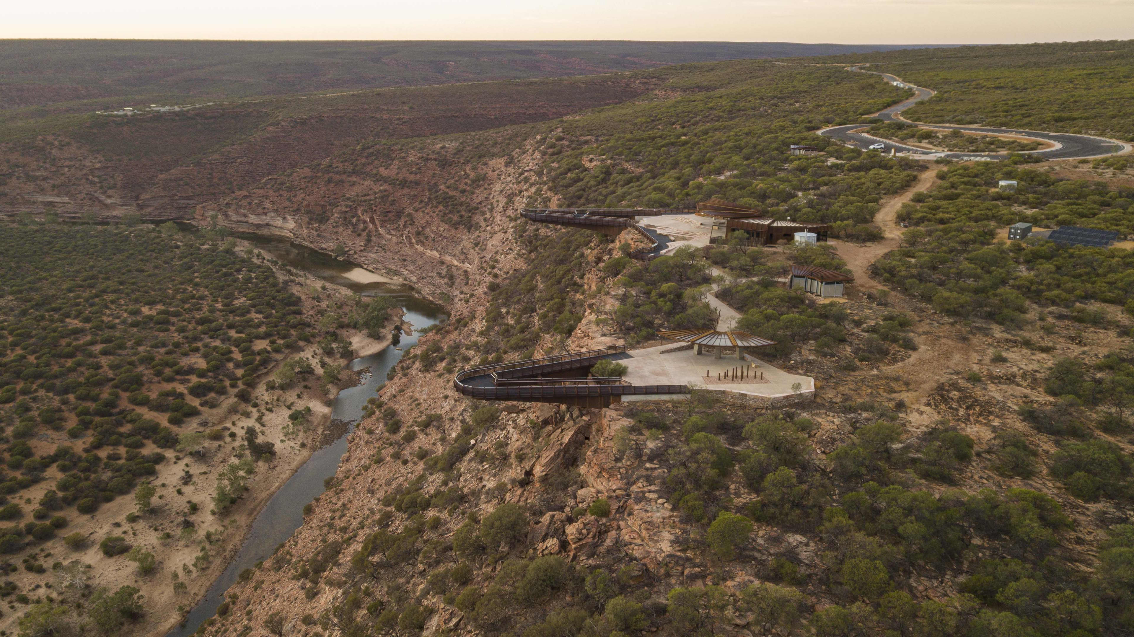 The Kalbarri Skywalk viewing platform juts out over the gorge, with a river running through the bottom.