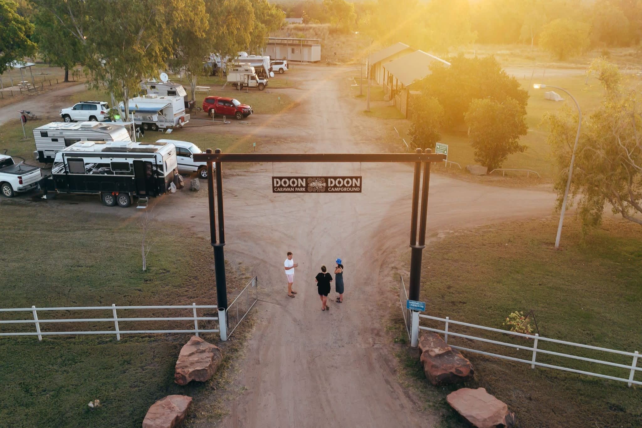An aerial, top-down view of the entrance to the Doon Doon Caravan Park and Campground.