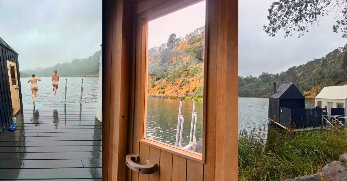 Small floating sauna sits on lake and people jump into water