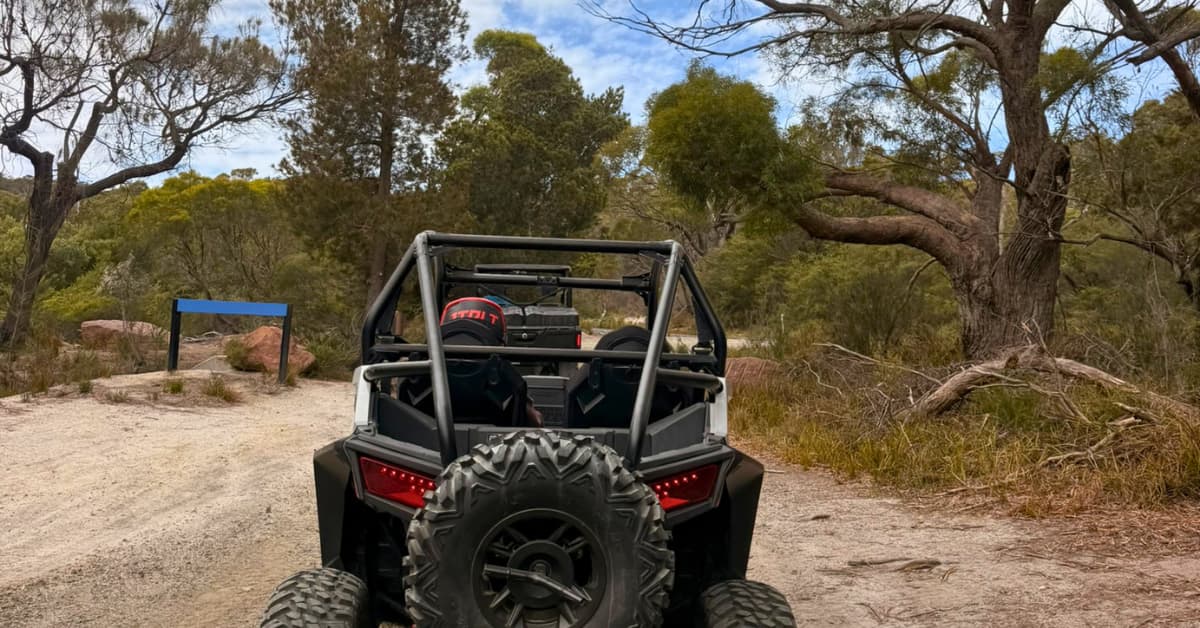 an all terrain buggy on dirt track