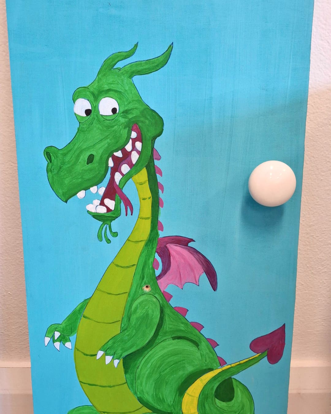 Dragon painted on door.