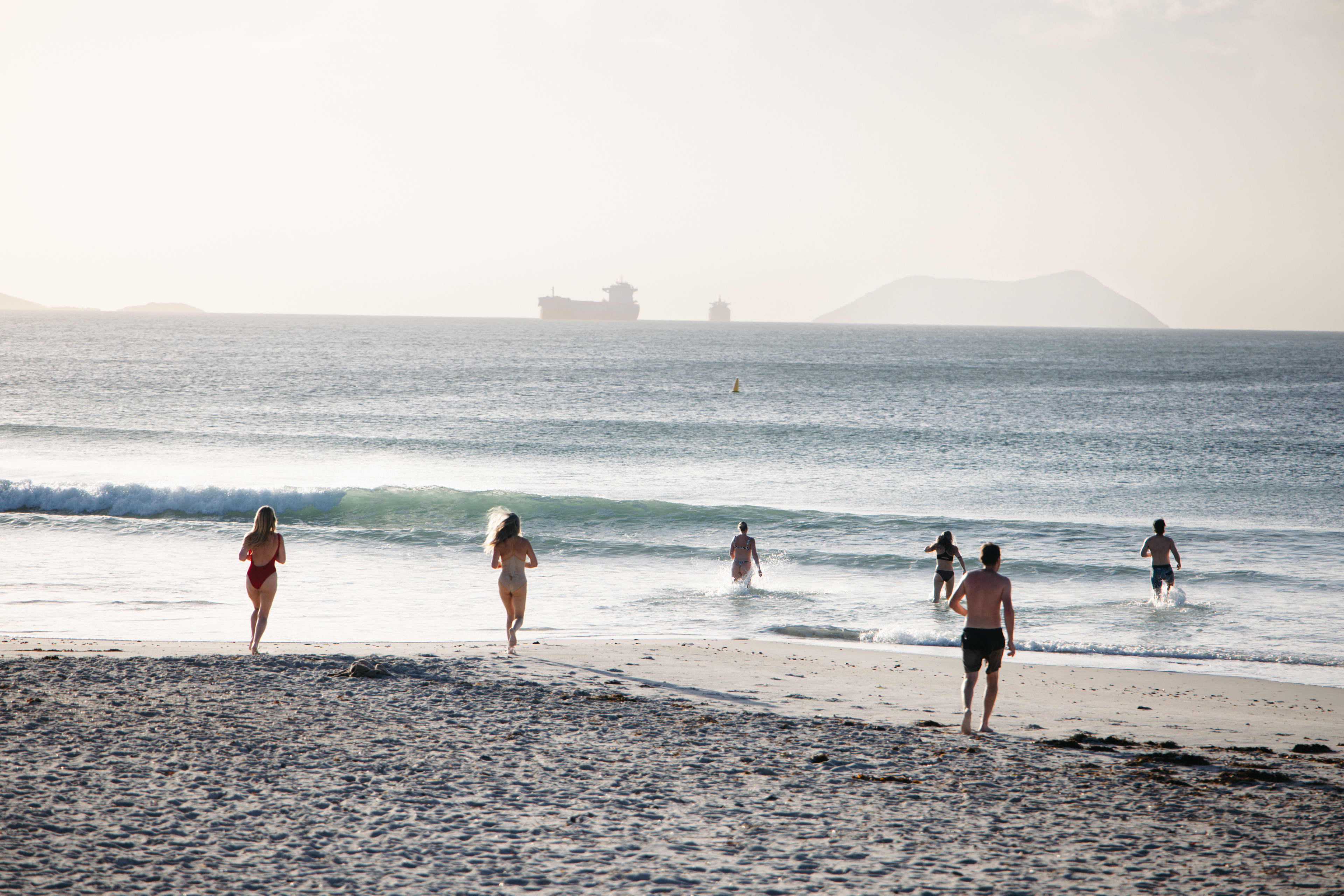 People swimming in ocean