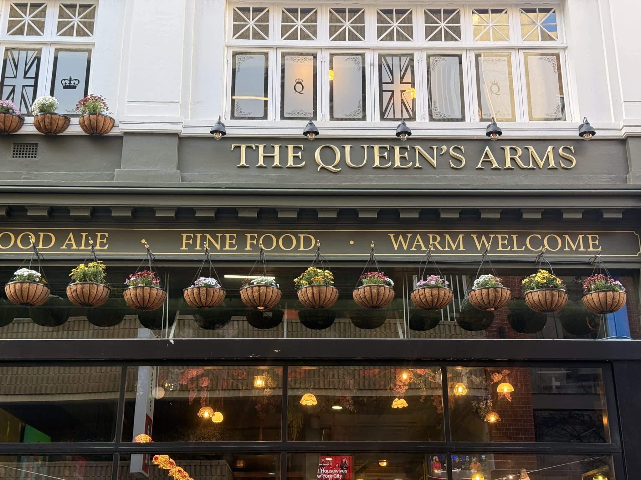 Exterior of heritage building in British pub style.