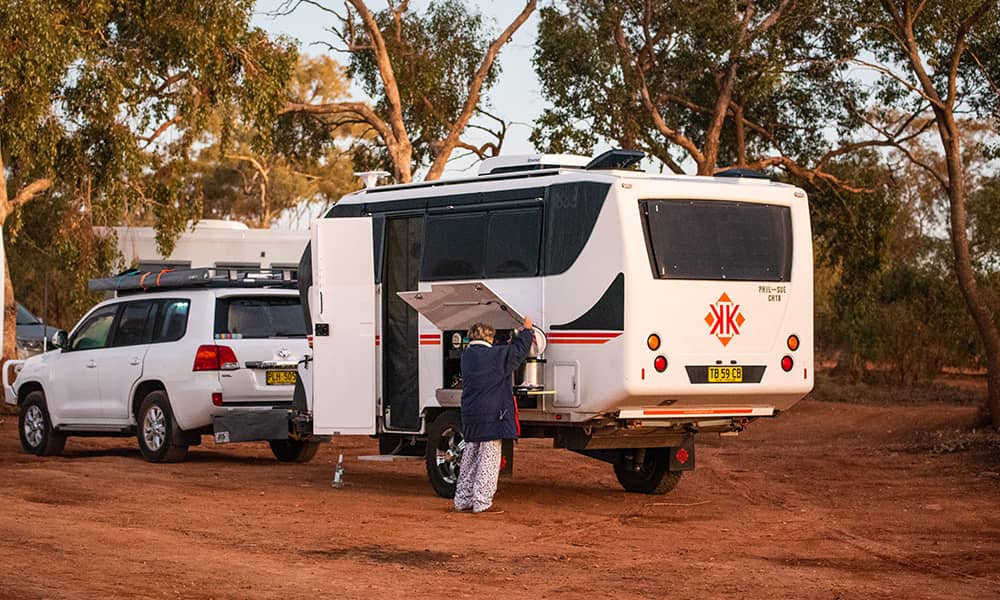 Image of woman packing a caravan