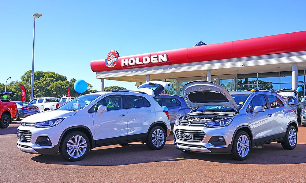 Two SUVs on display at a car yard