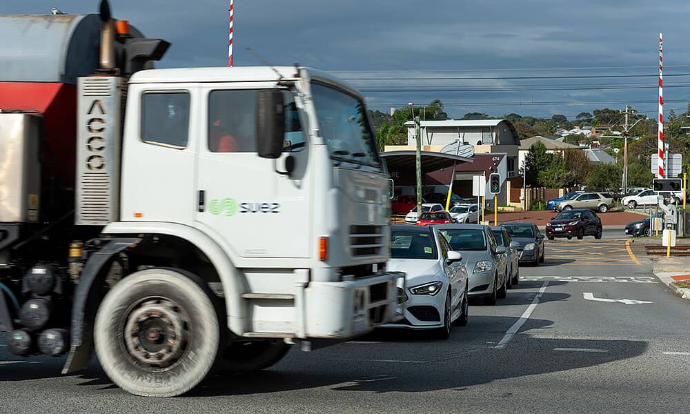 Cars crossing a busy intersection in Cottesloe WA