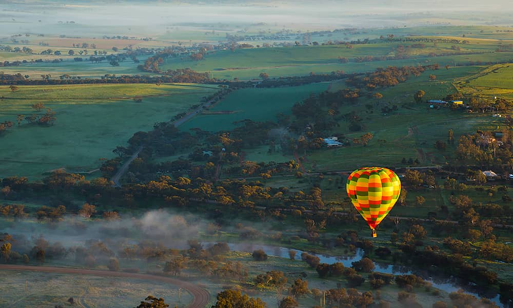 An aerial view of a hot air balloon over the Avon Valley