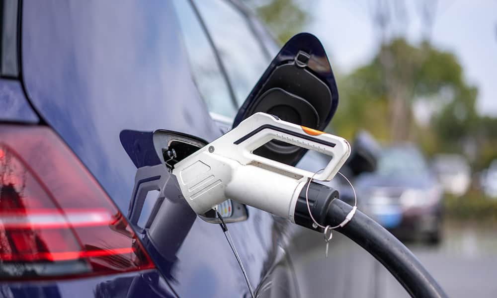 Electric car plugged in to charge