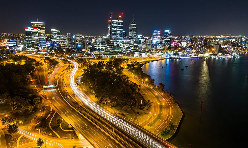 Perth city at night showing the freeway lit up