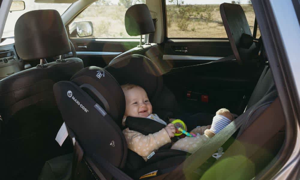 Baby in baby seat in car