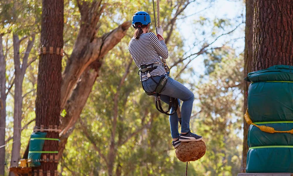 Image of woman on zipline