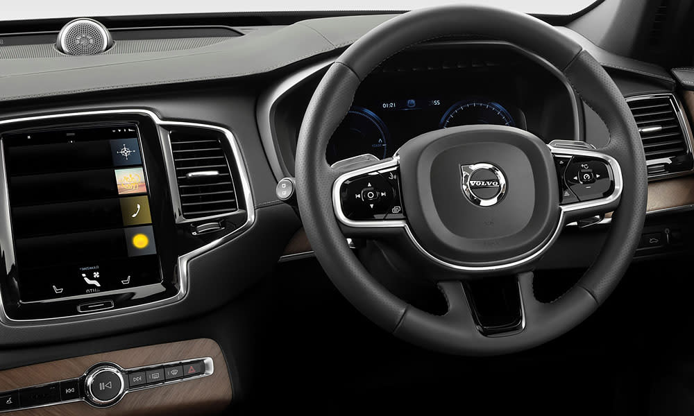Inside a car showing steering wheel