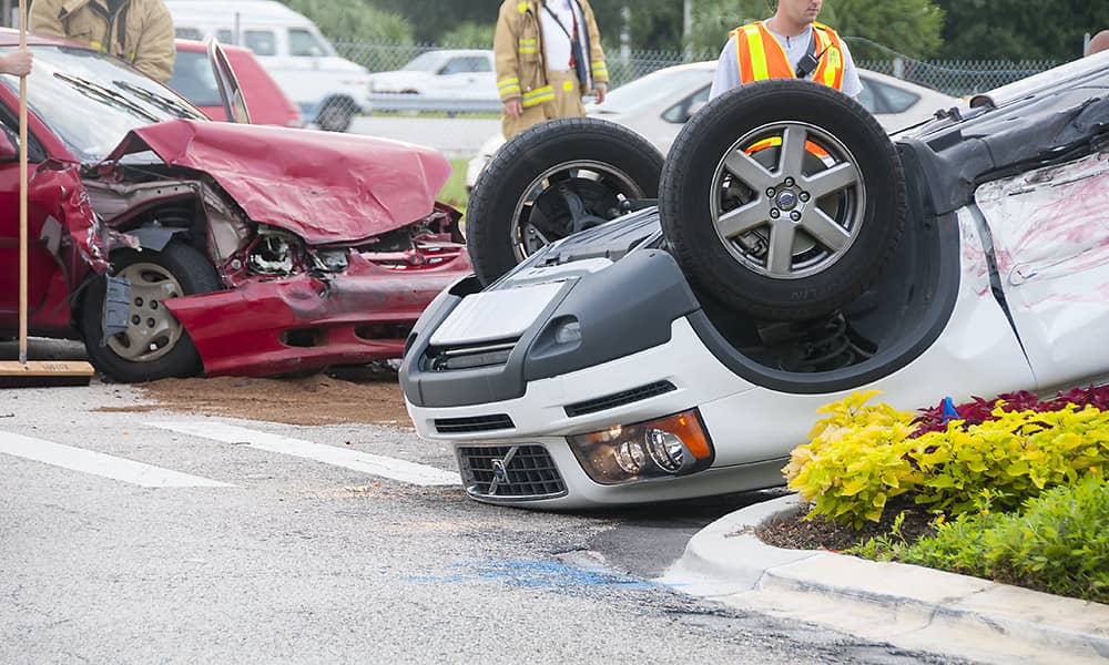 Two cars attended by emergency services after a major crash