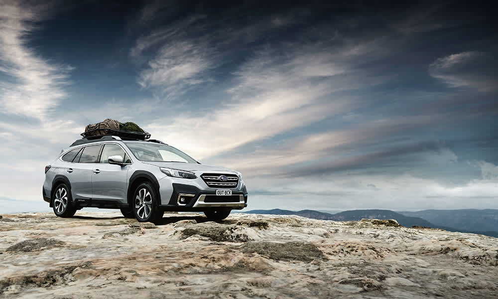 A Subaru Outback on rocky terrain